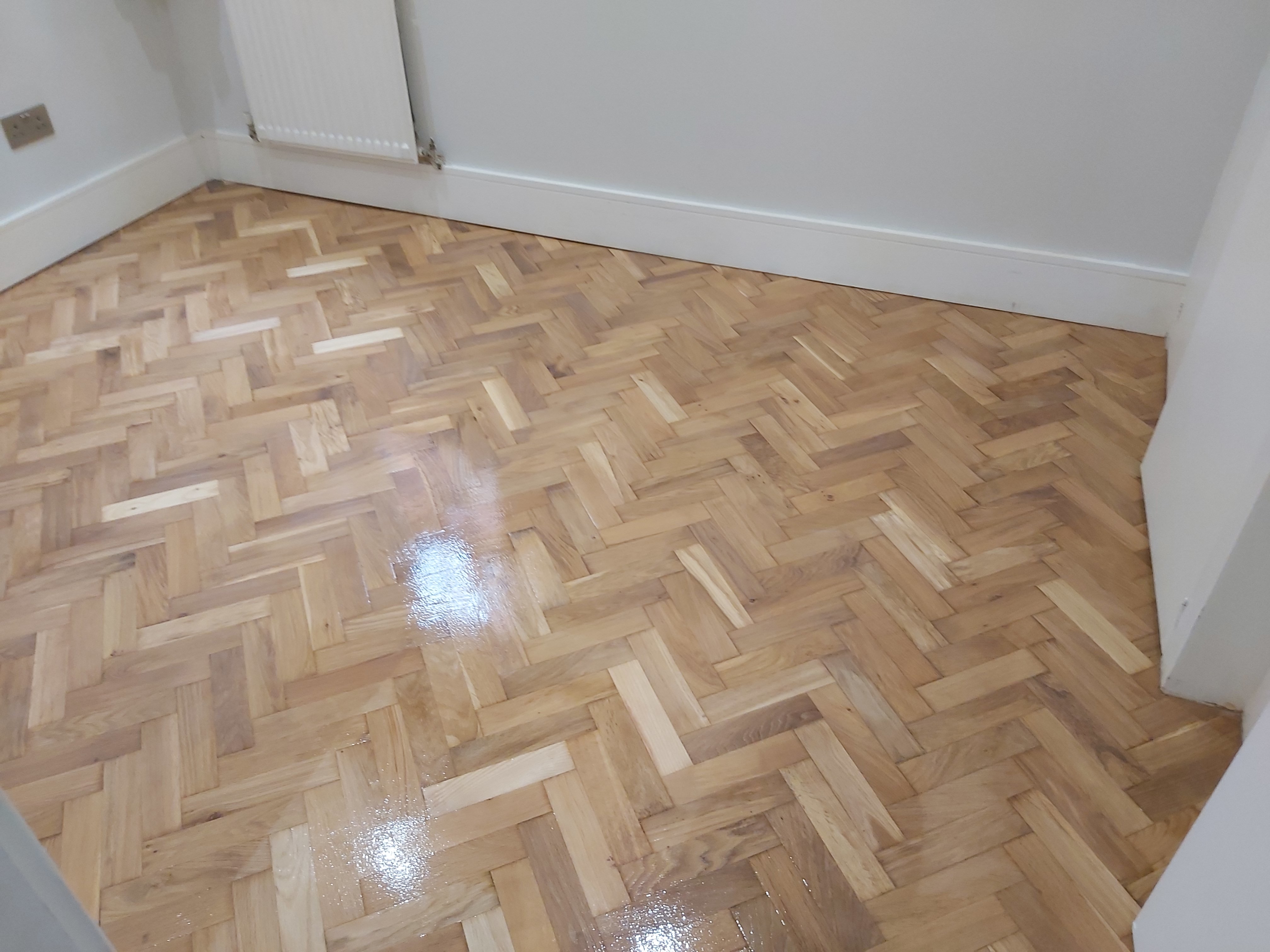 Parquet floor after sanding work in SW9