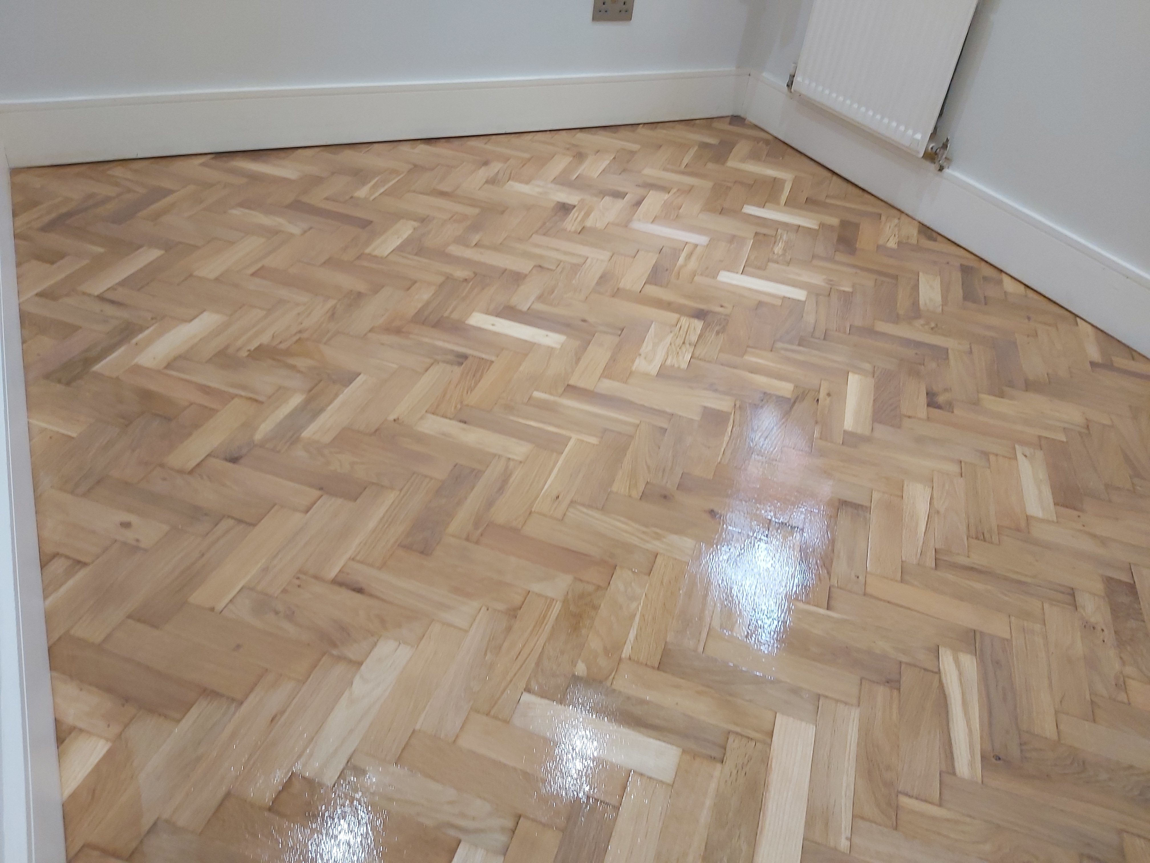 Parquet floor after sanding work in SW9