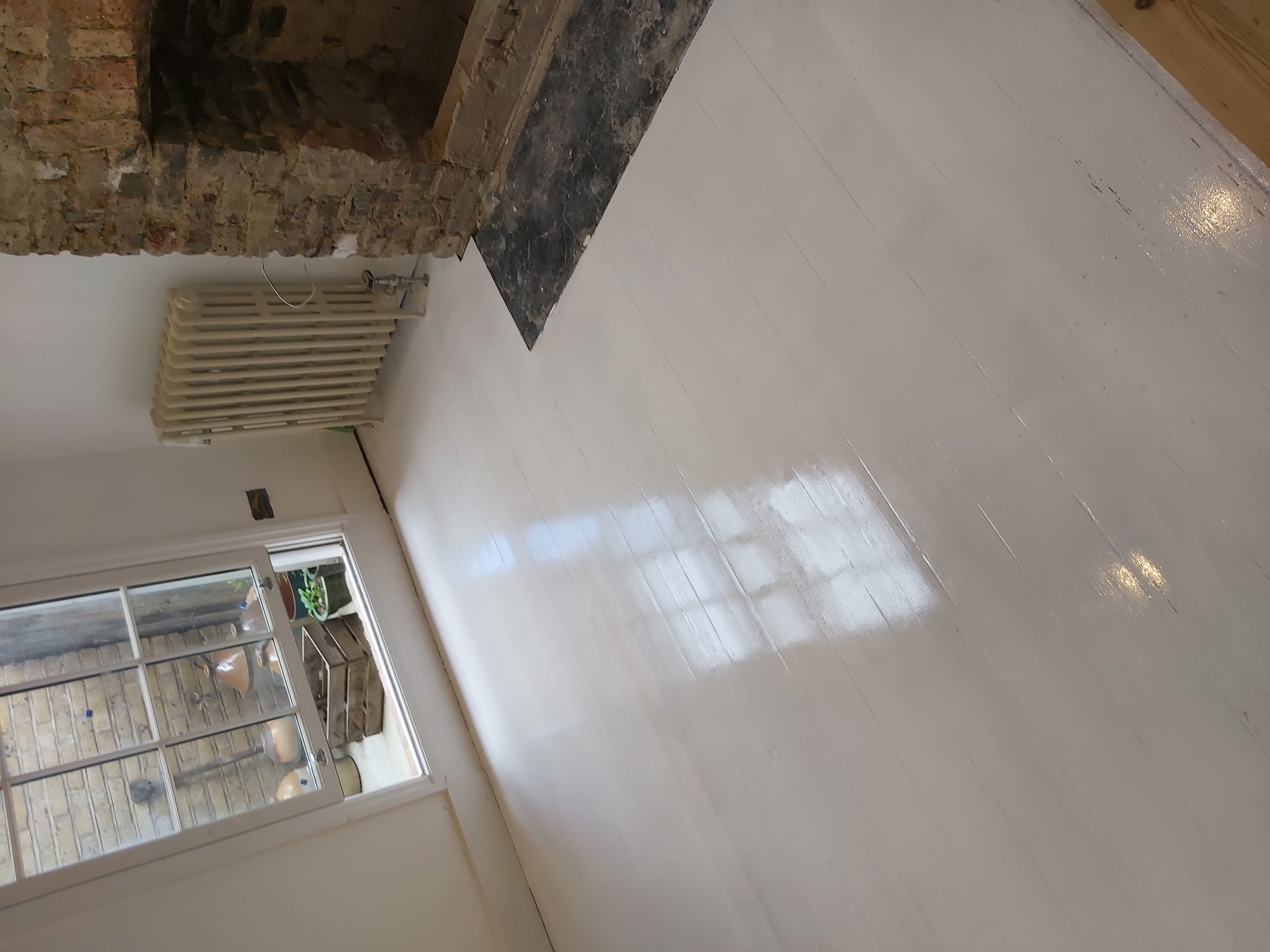 Floorboards floor after sanding work in SW9