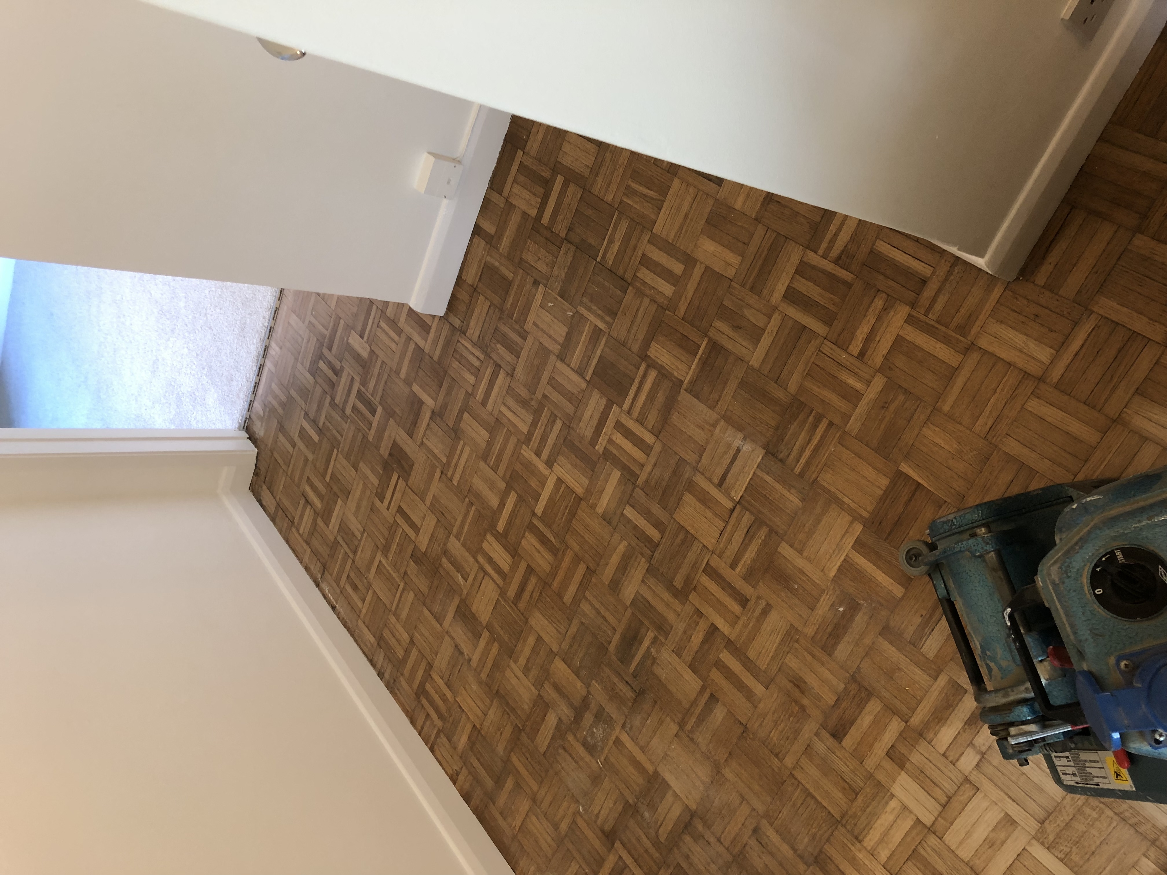 Parquet floor after sanding work in TW12