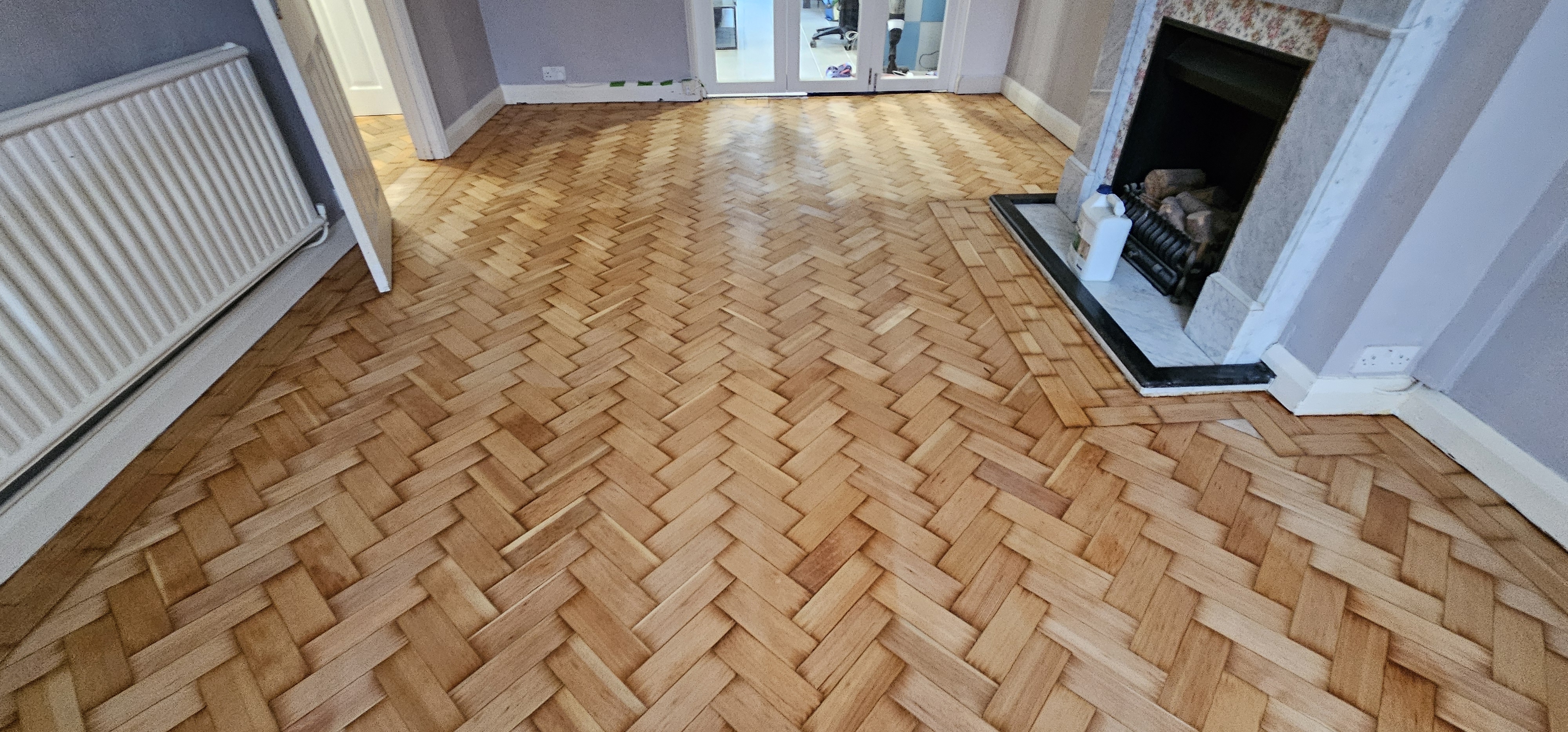 Parquet floor after sanding work in TW2
