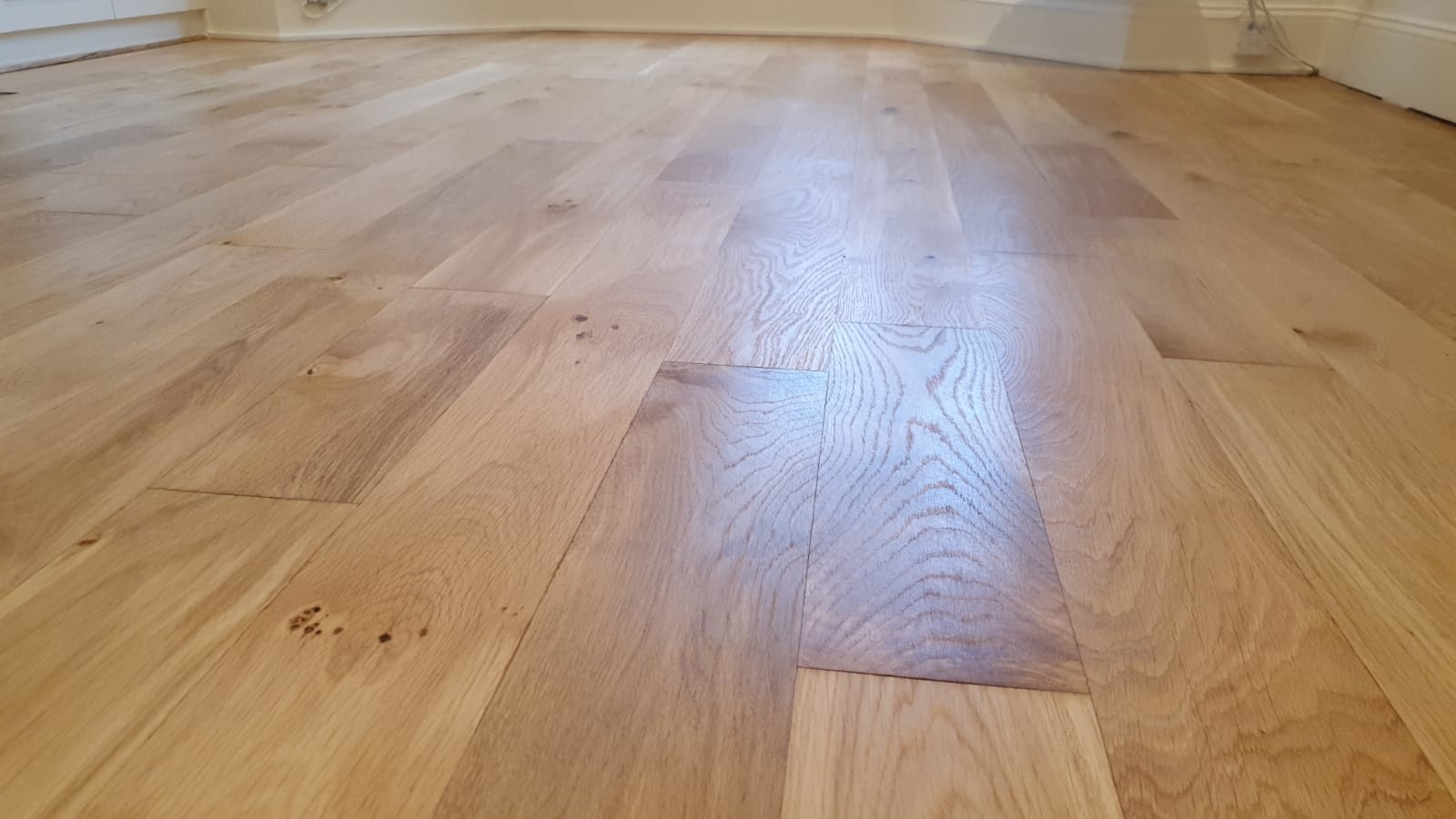 Hardwood floor after sanding work in TW7