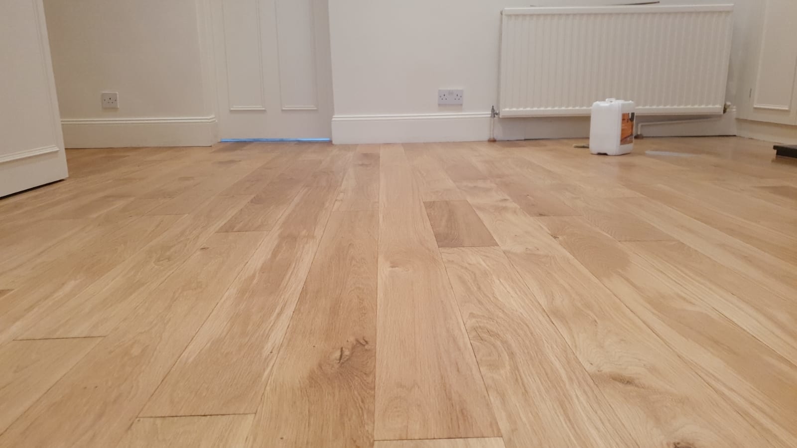 Hardwood floor after sanding work in TW7