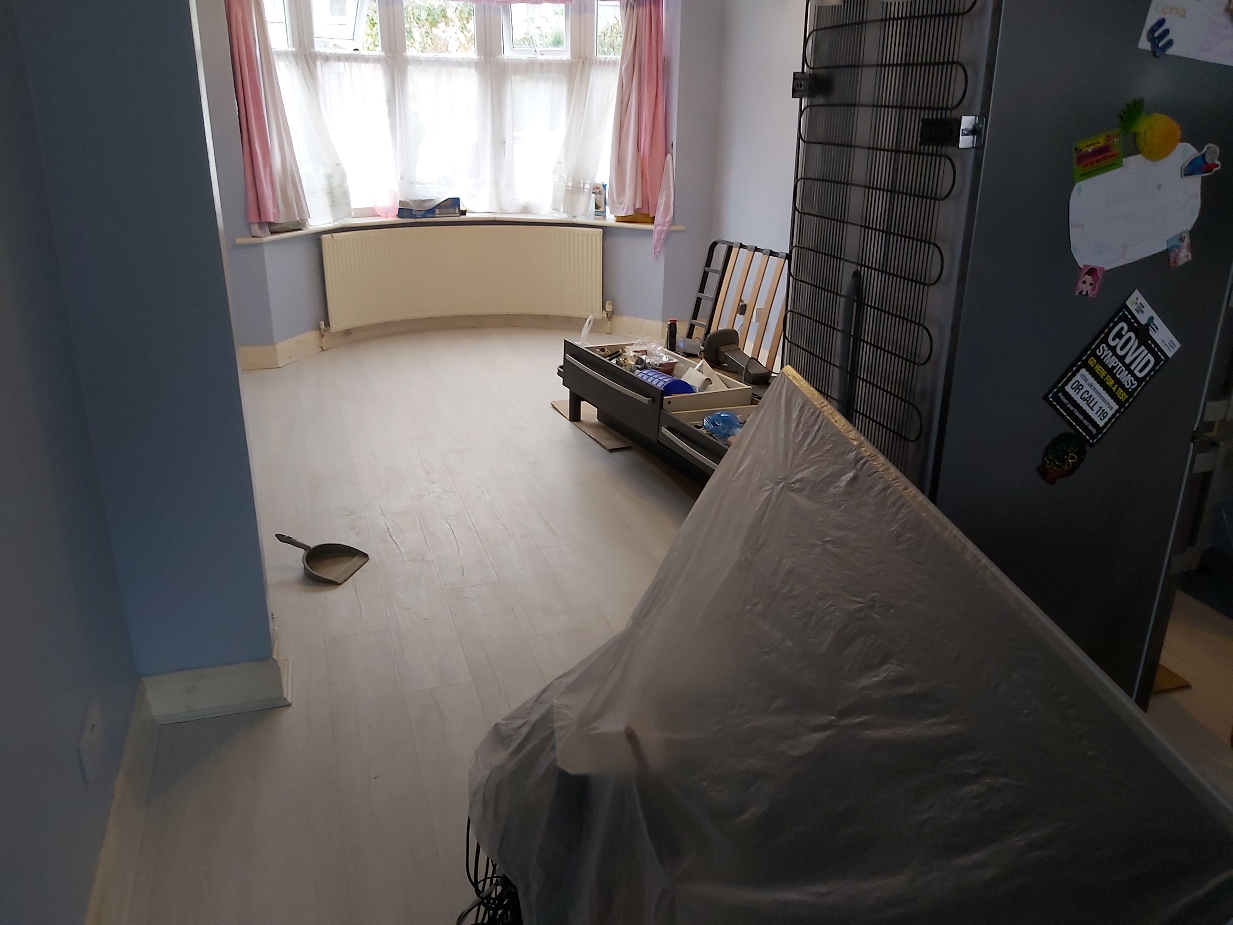 Laminate floor after fitting work in UB1