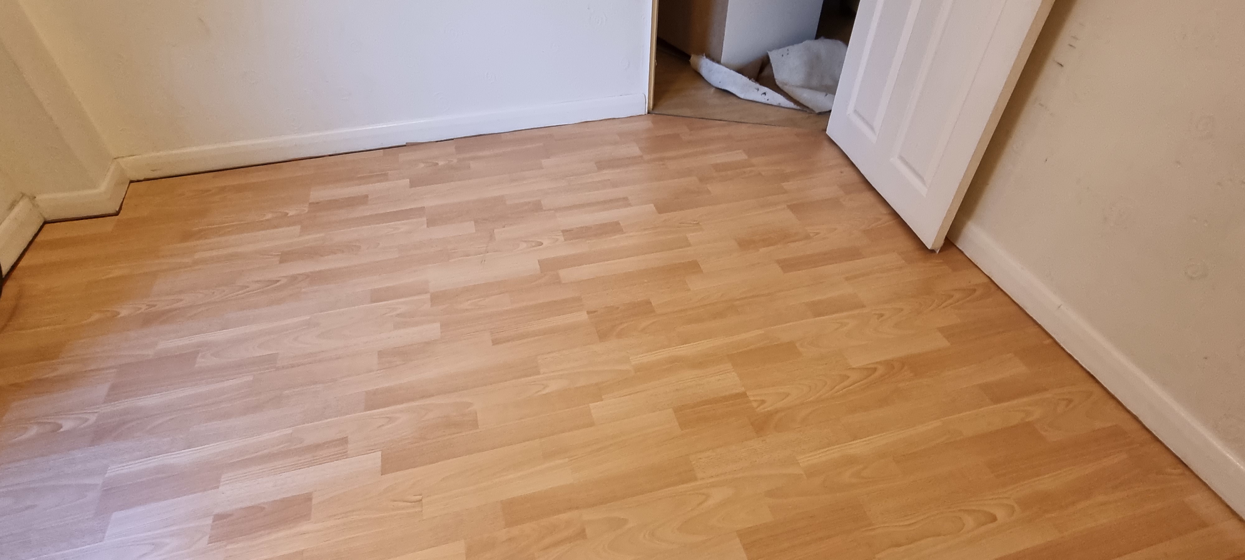 Laminate floor after fitting work in UB7