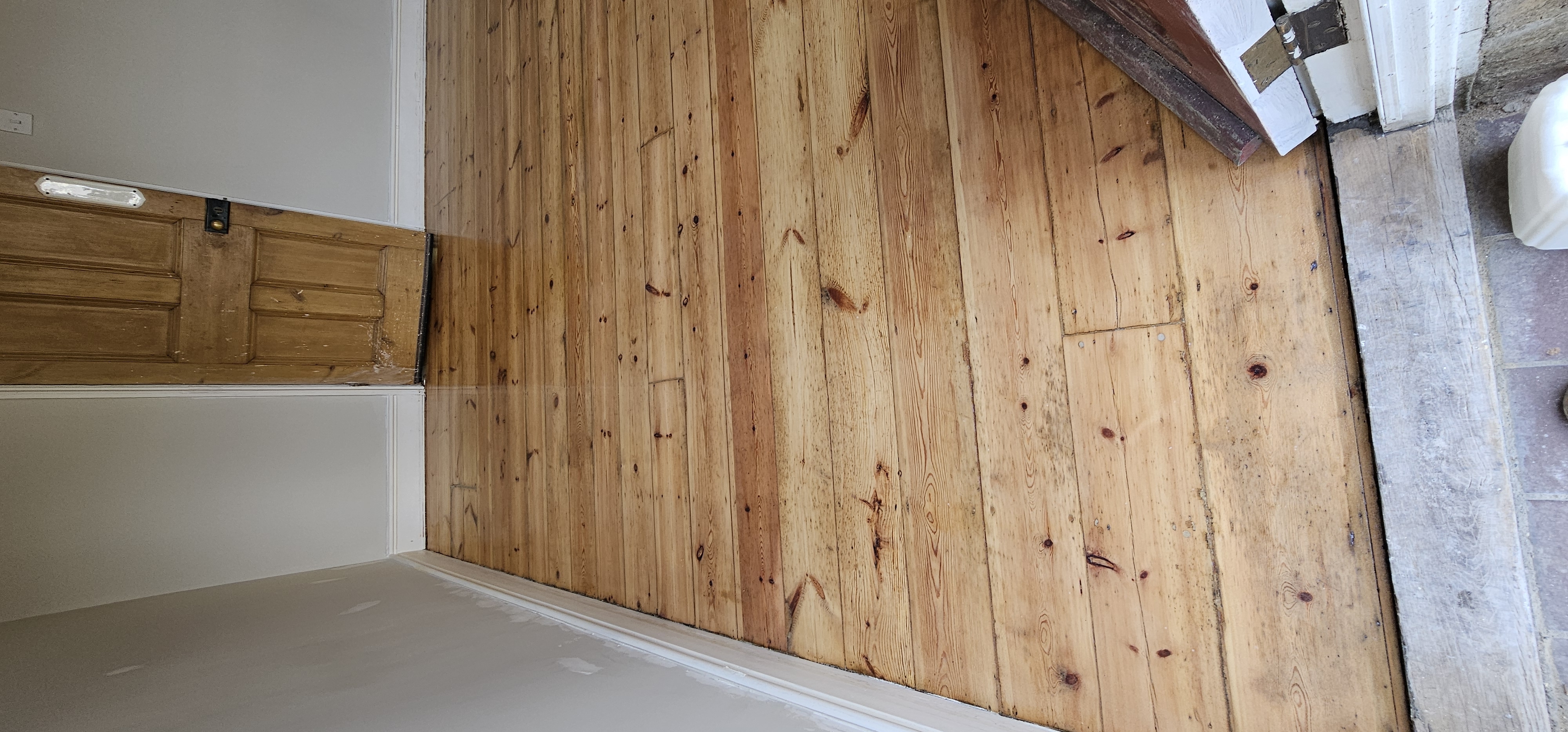 Floorboards floor after sanding work in UB8