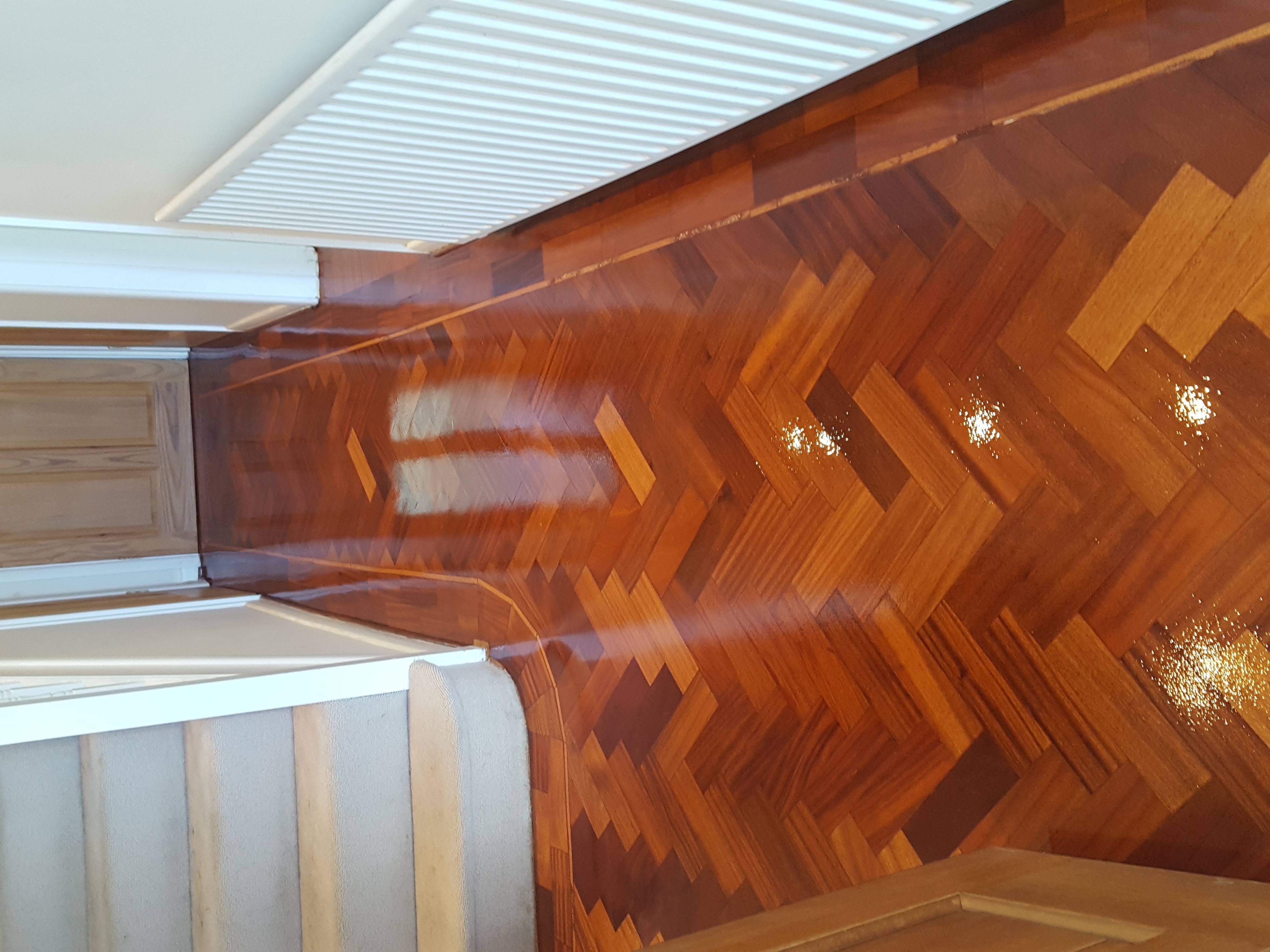 Parquet floor after sanding work in UB9