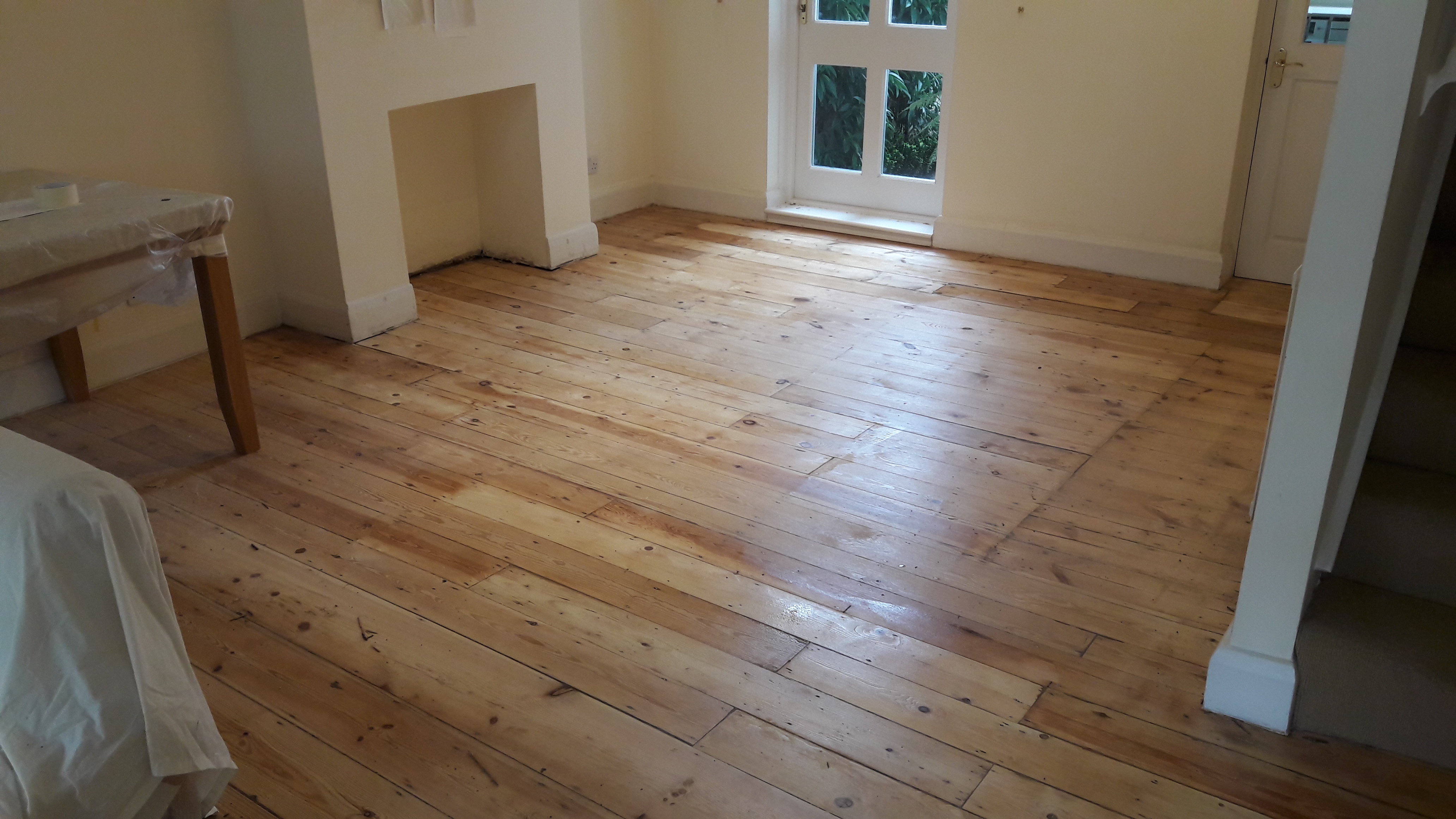Floorboards floor after sanding work in W10