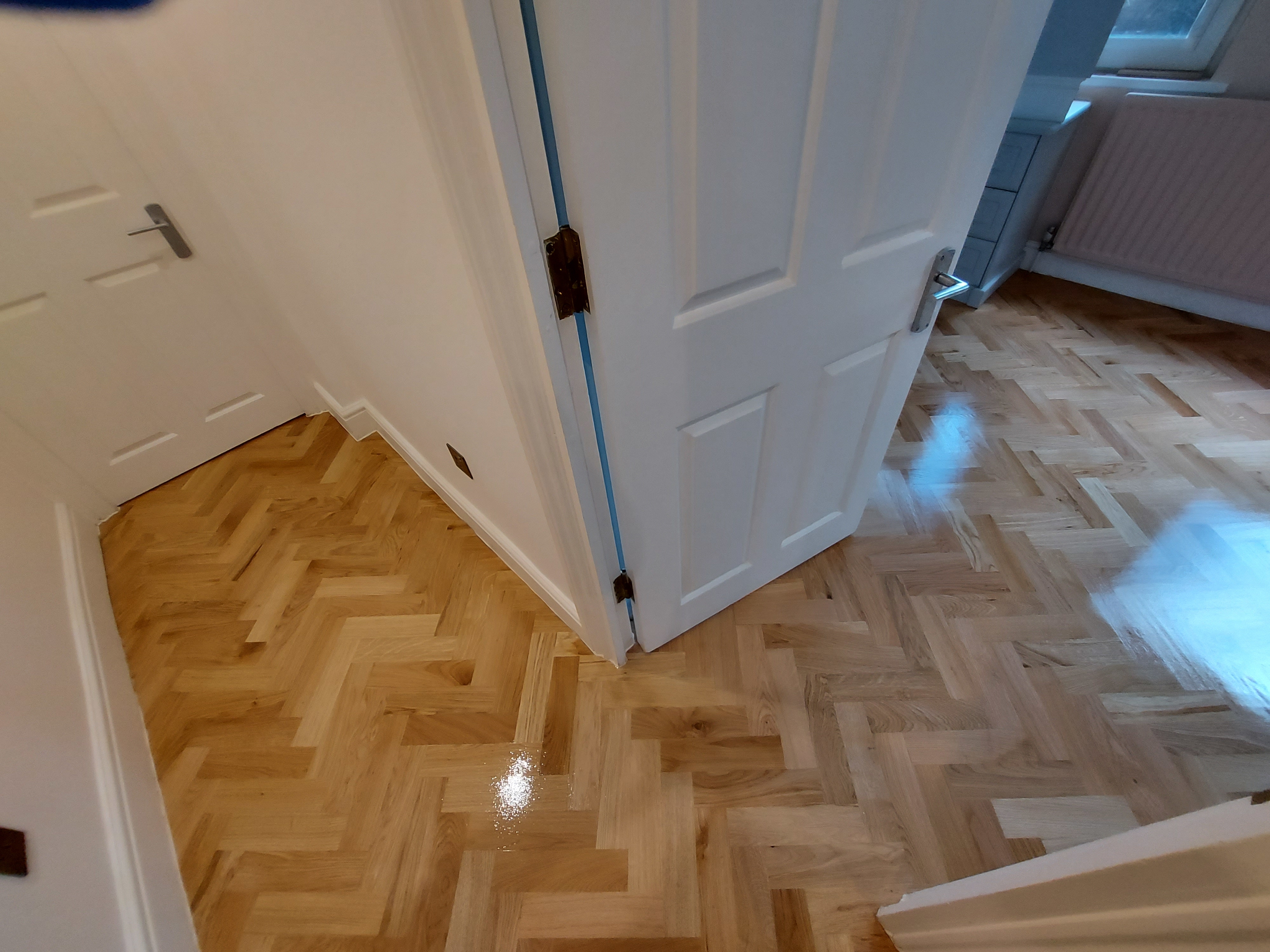 Parquet floor after sanding work in W112RE