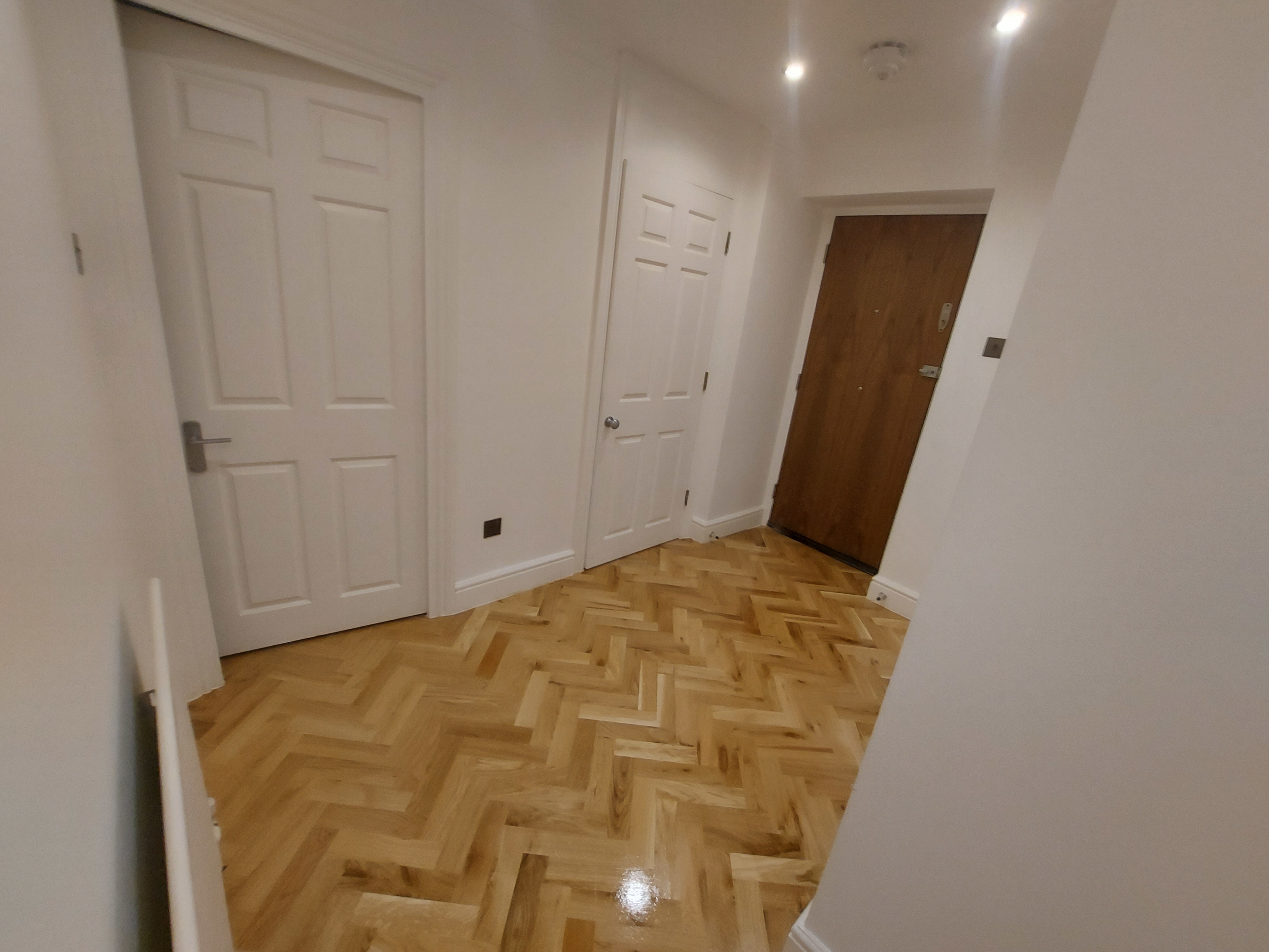 Parquet floor after sanding work in W112RE