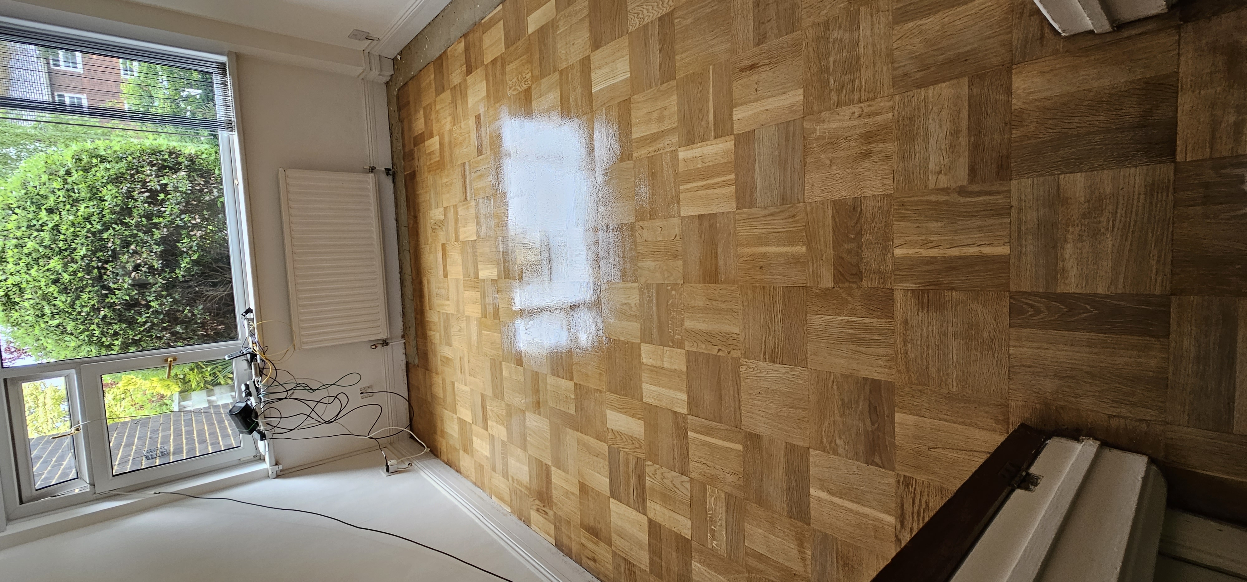 Parquet floor after sanding work in W13
