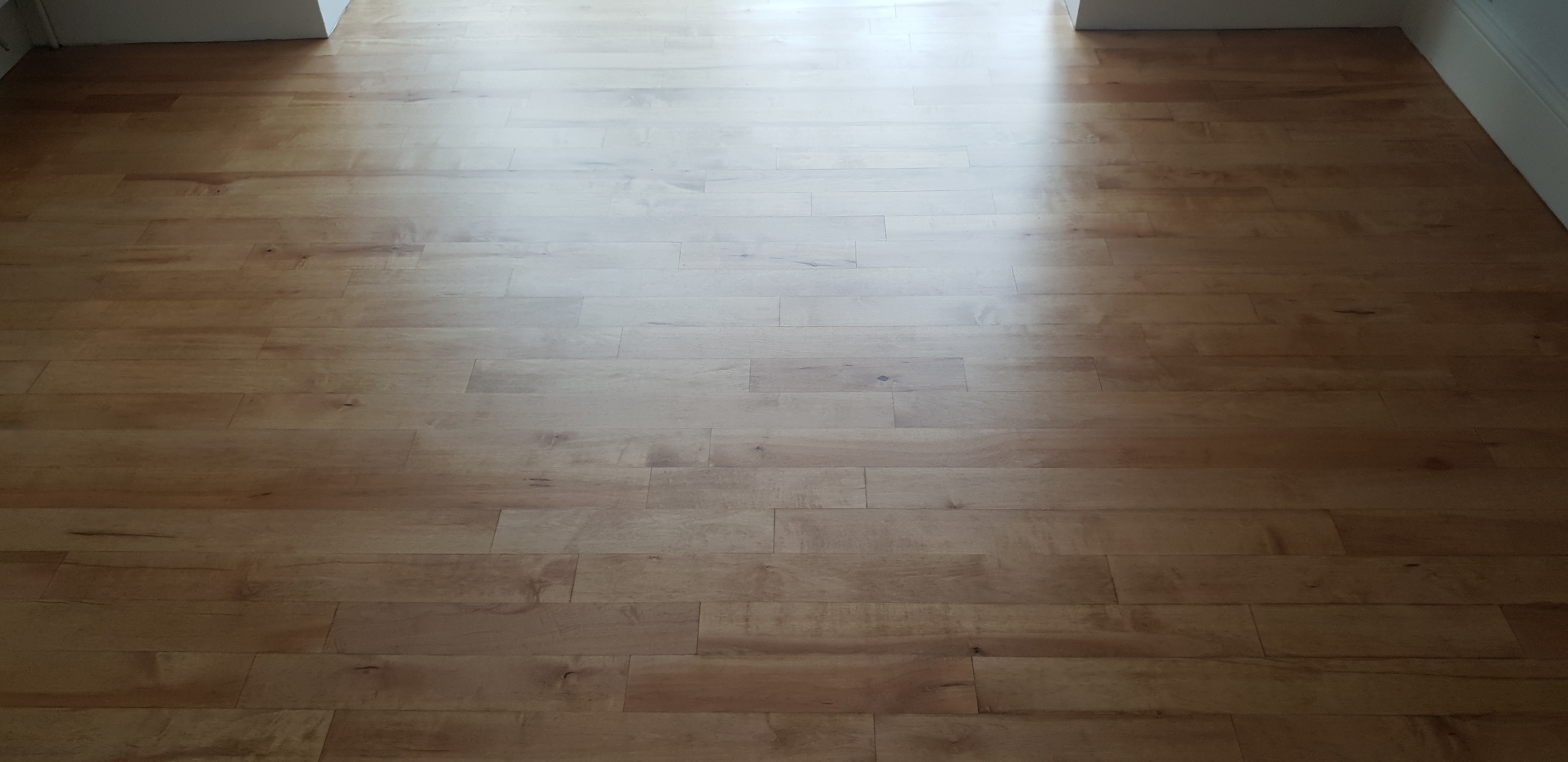 Hardwood floor after sanding work in W13