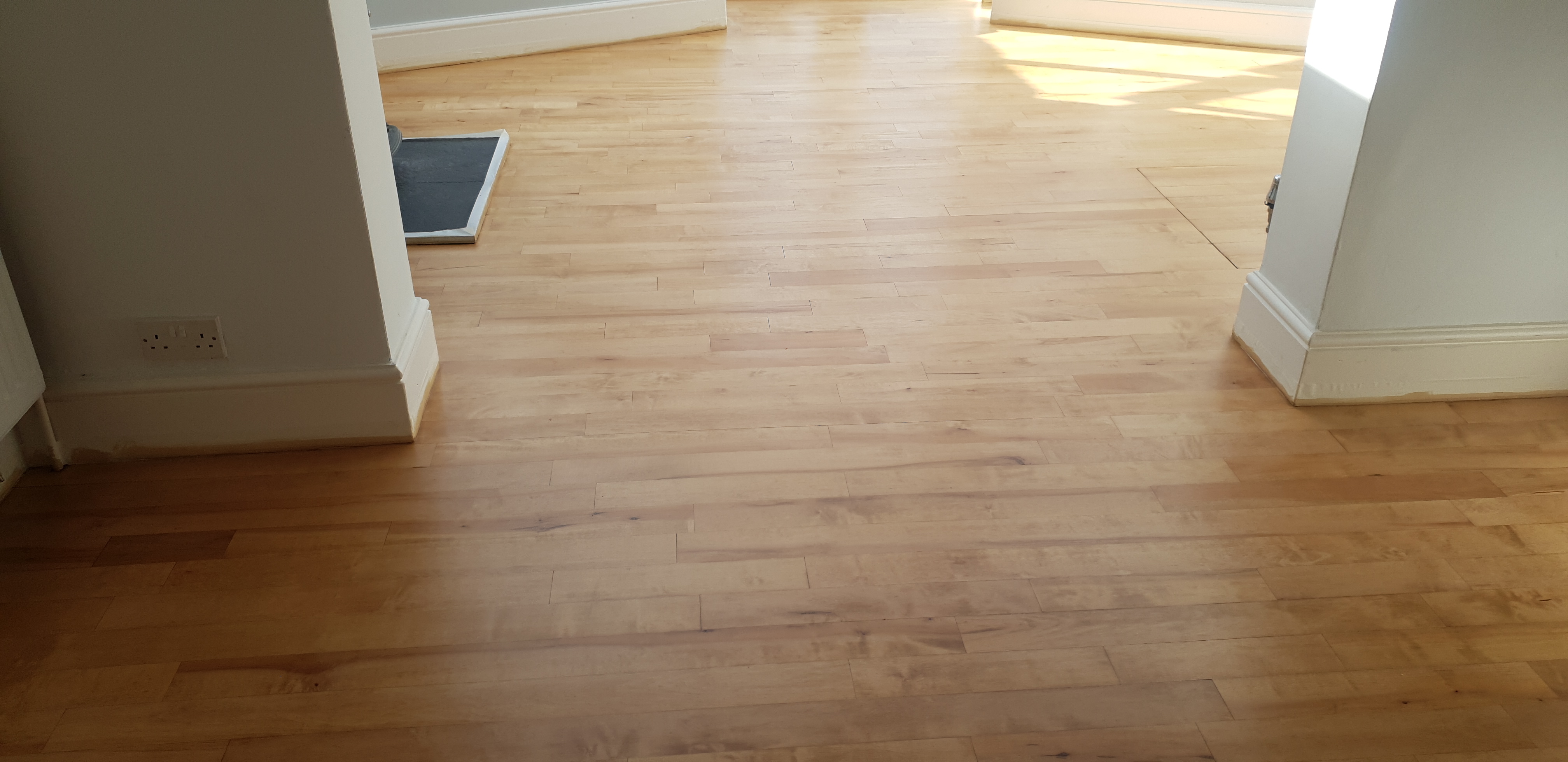 Hardwood floor after sanding work in W13