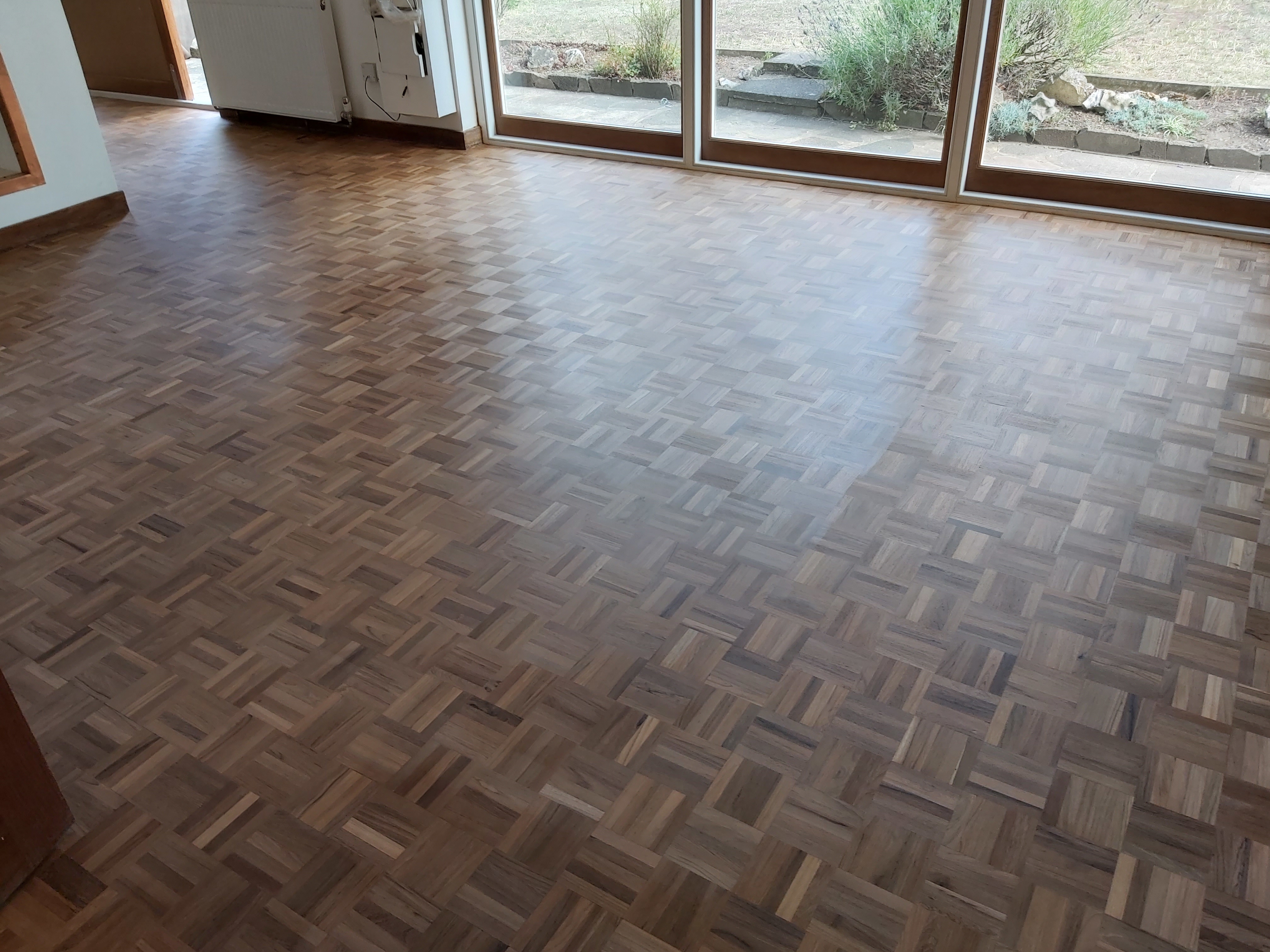 Parquet floor after sanding work in W13