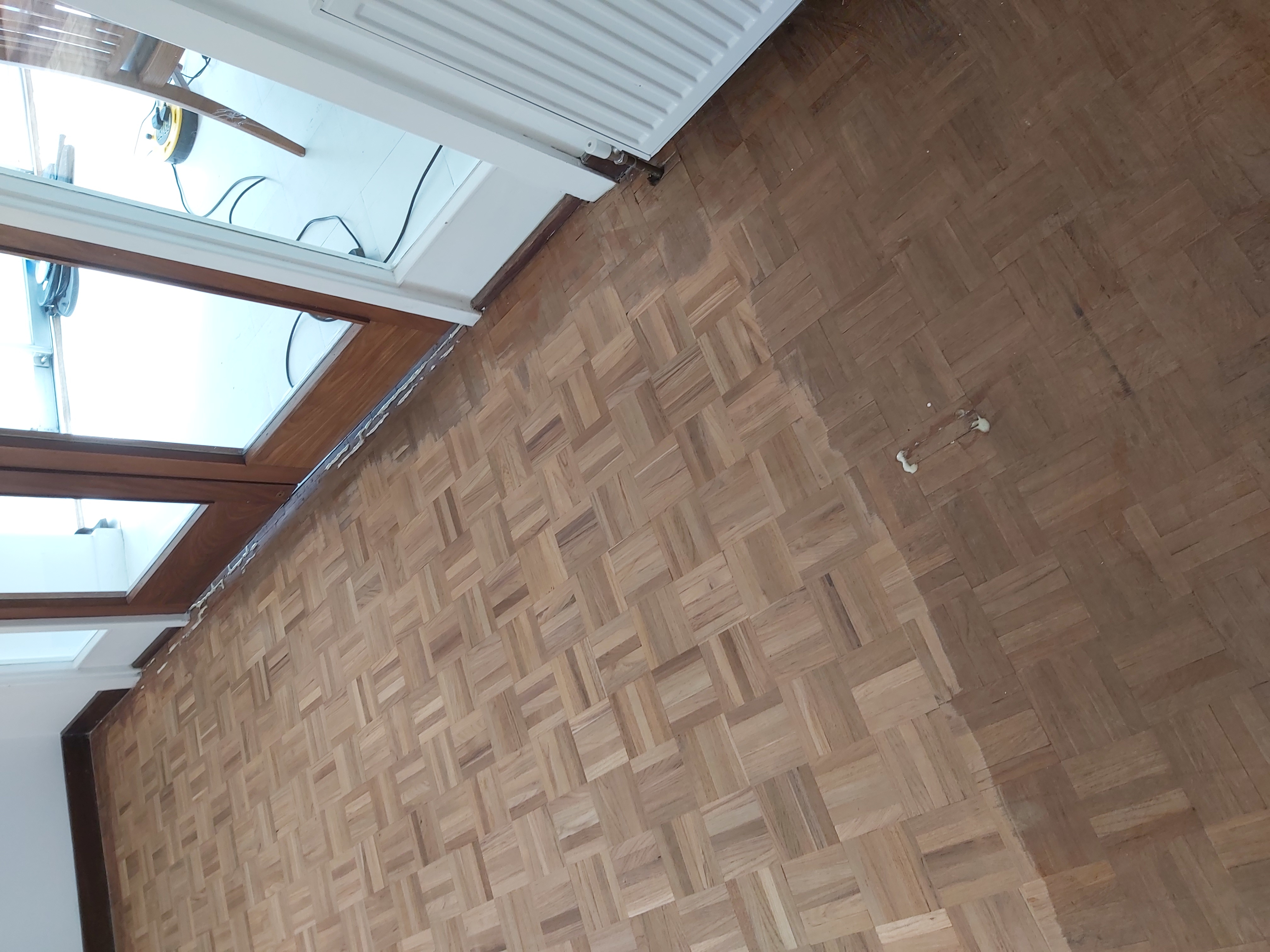 Parquet floor after sanding work in W13