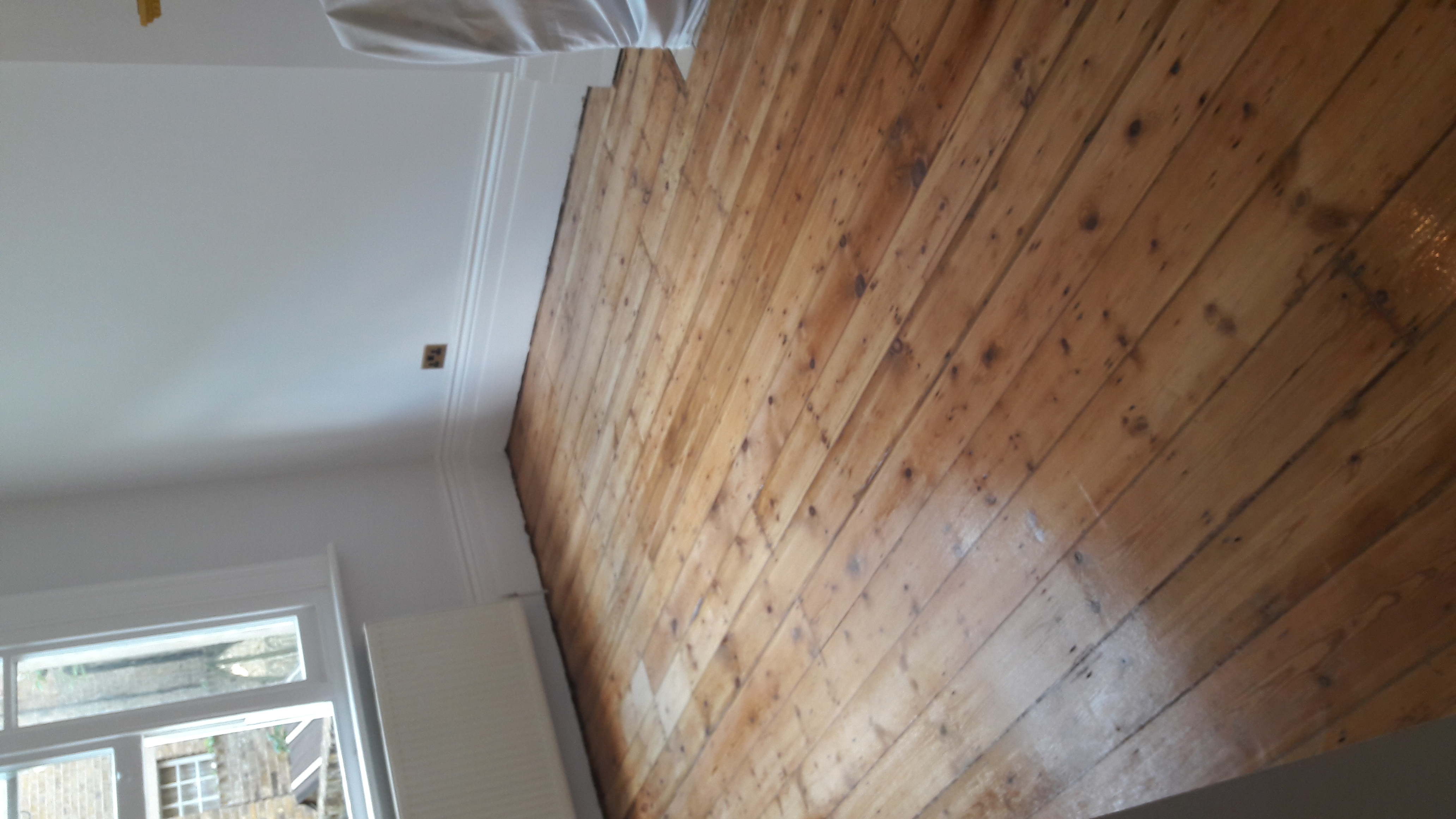 Floorboards floor after sanding work in W14
