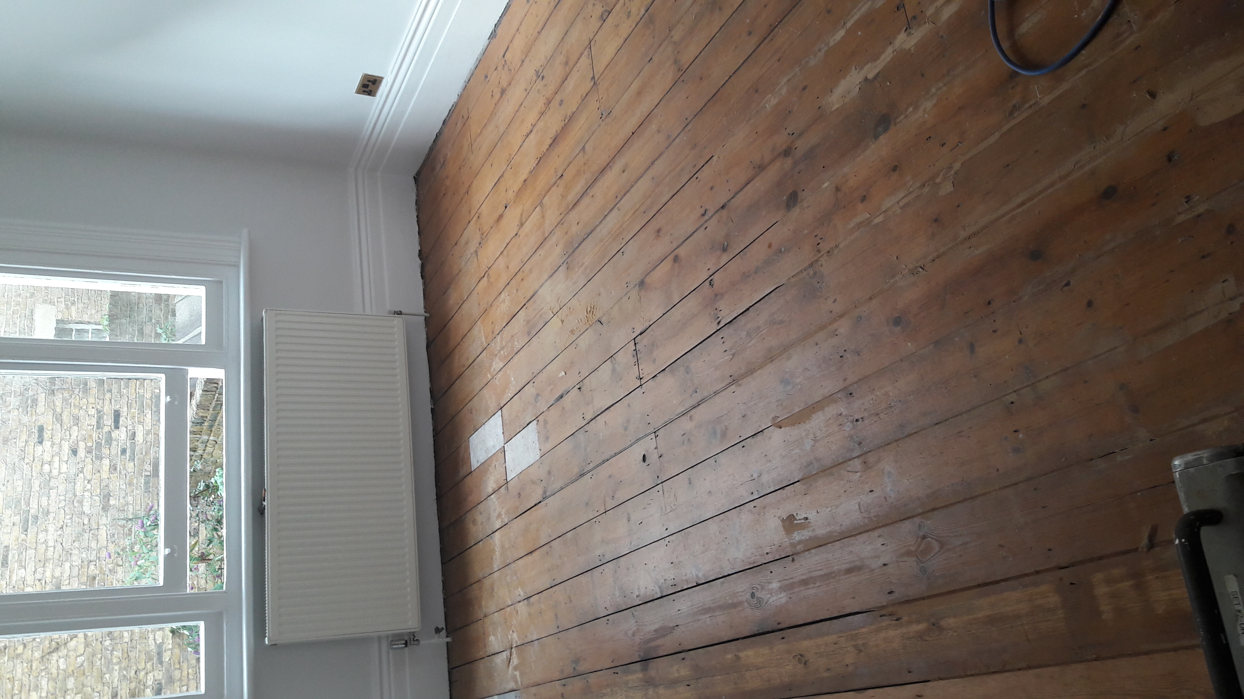 Floorboards floor after sanding work in W14