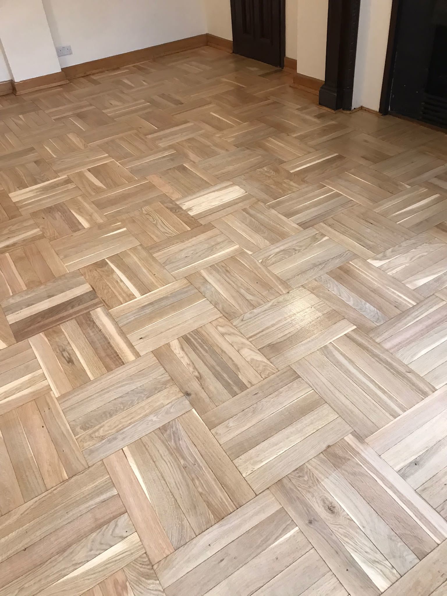 Hardwood floor after sanding work in W1B