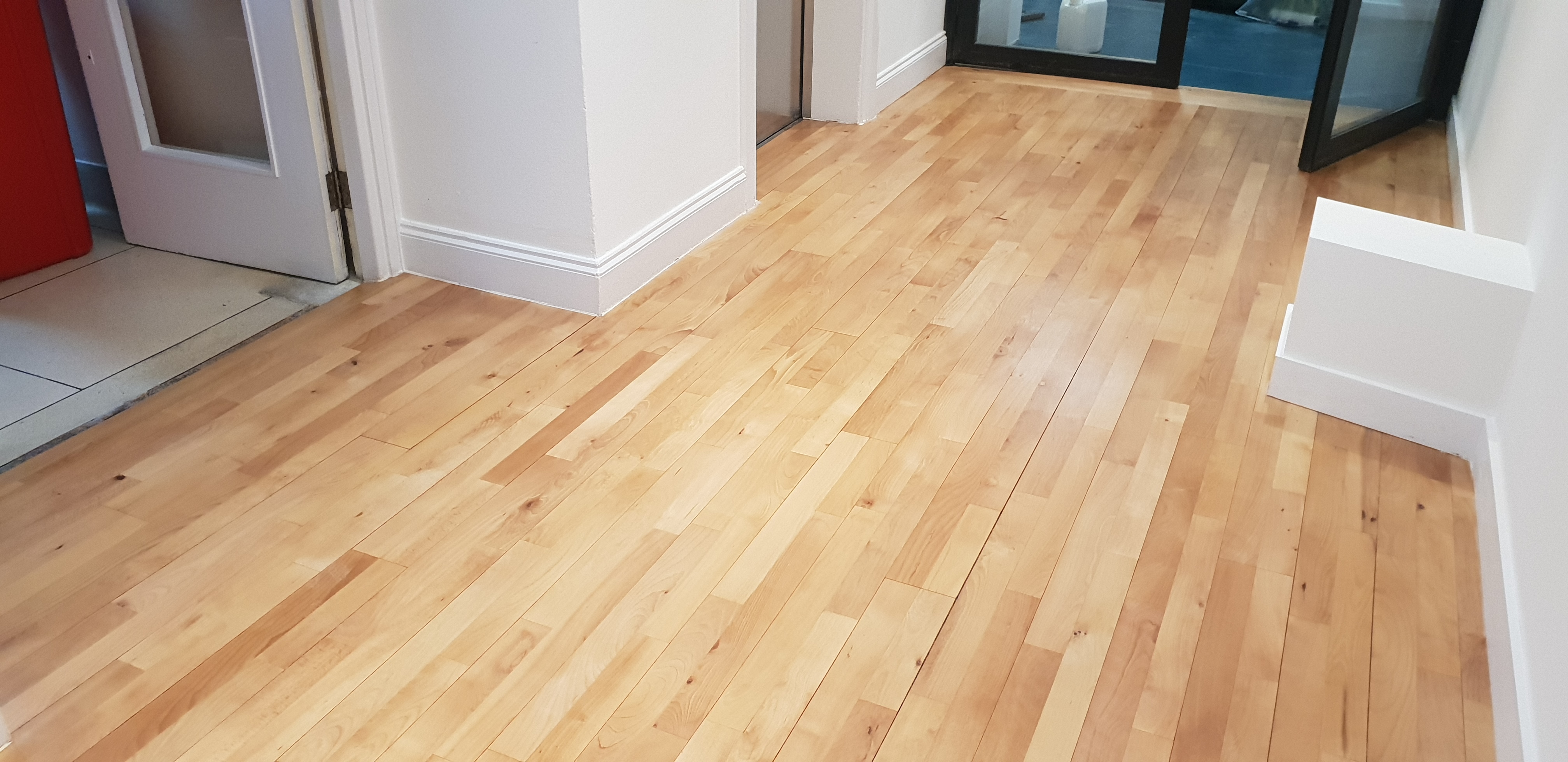 Hardwood floor after sanding work in W1S