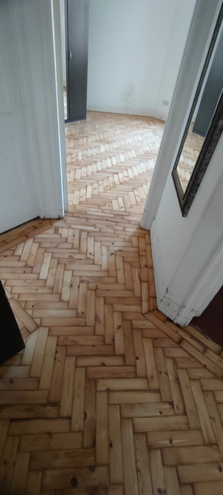 Parquet floor after sanding work in W2