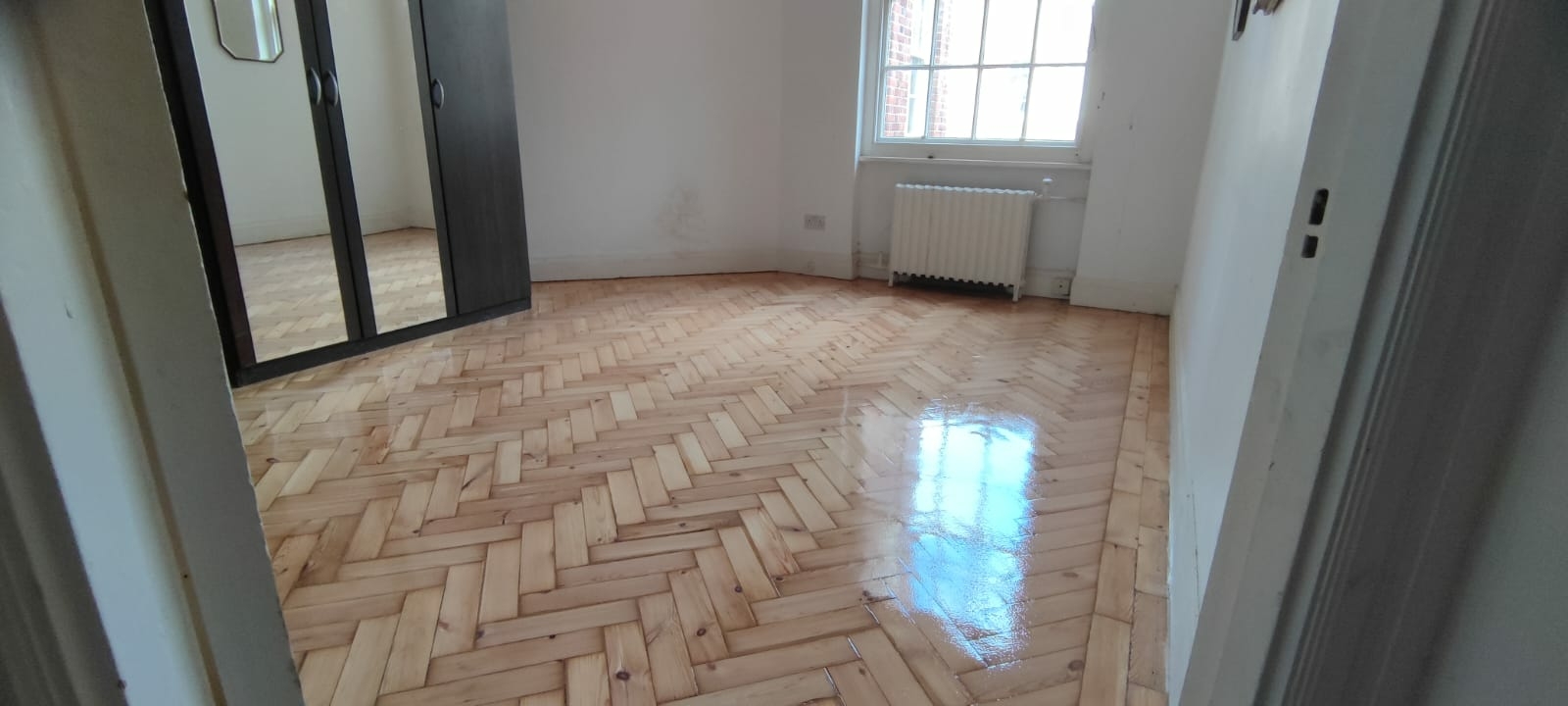 Parquet floor after sanding work in W2