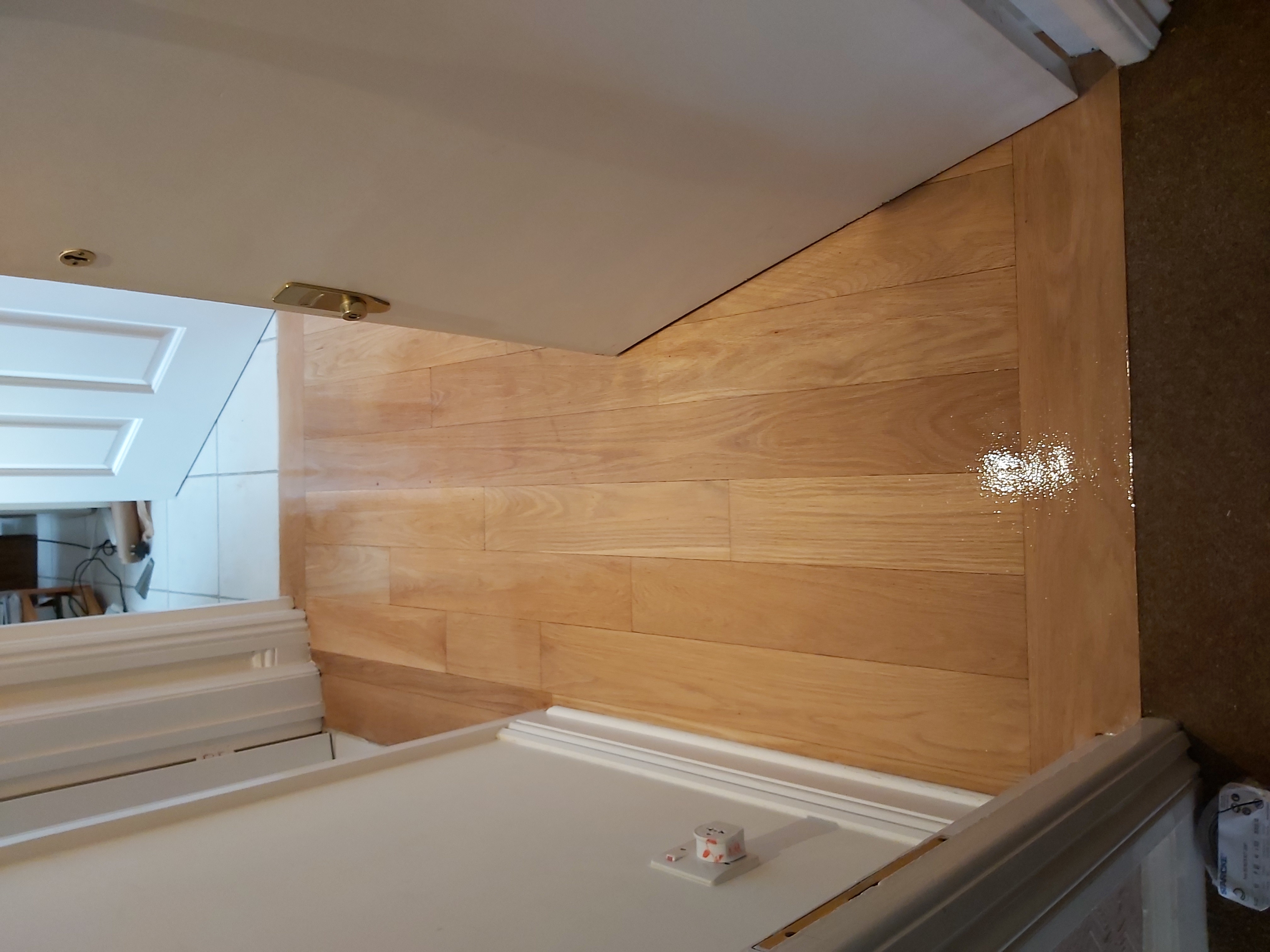 Hardwood floor after sanding work in W2