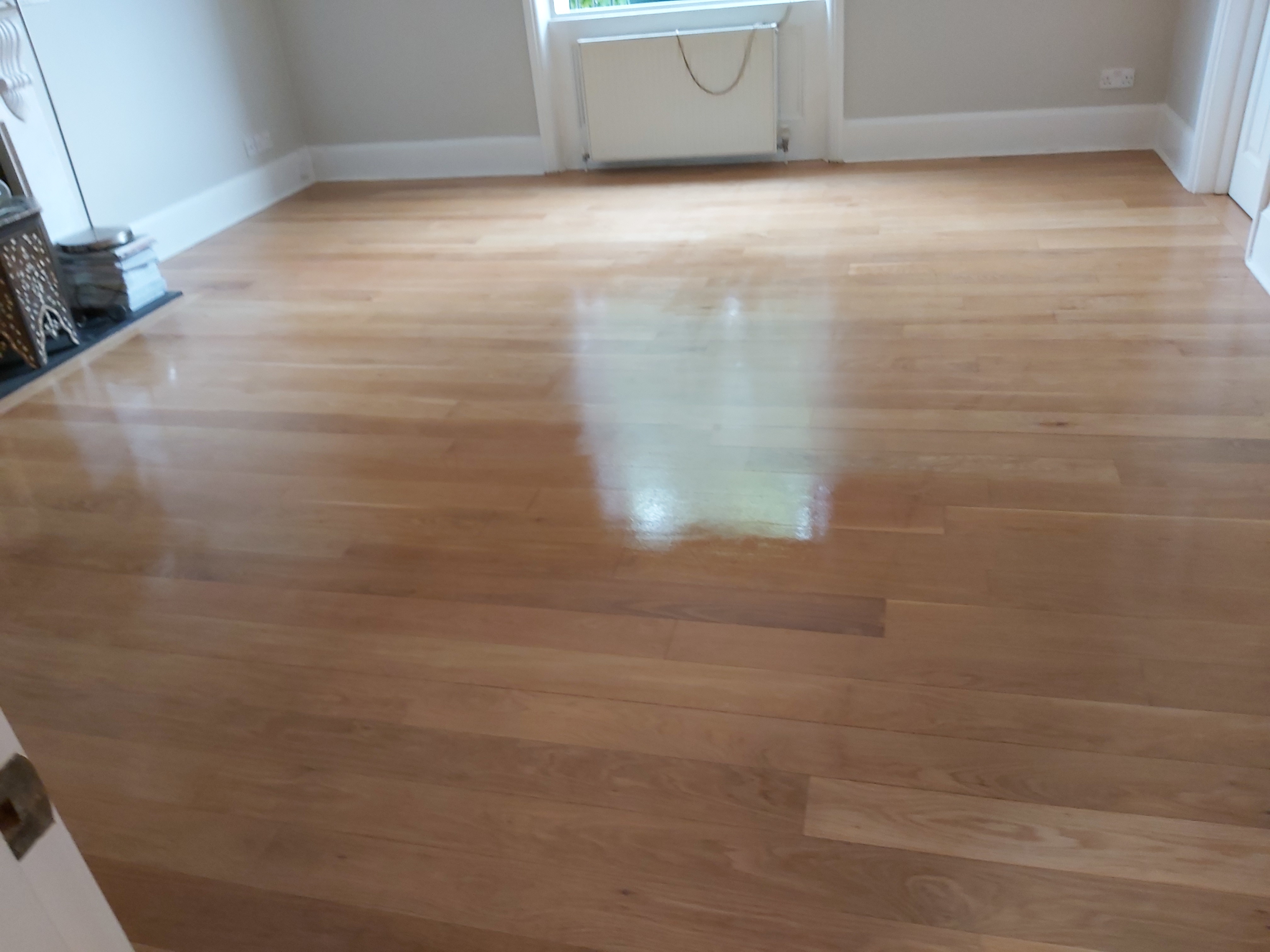 Hardwood floor after sanding work in W2