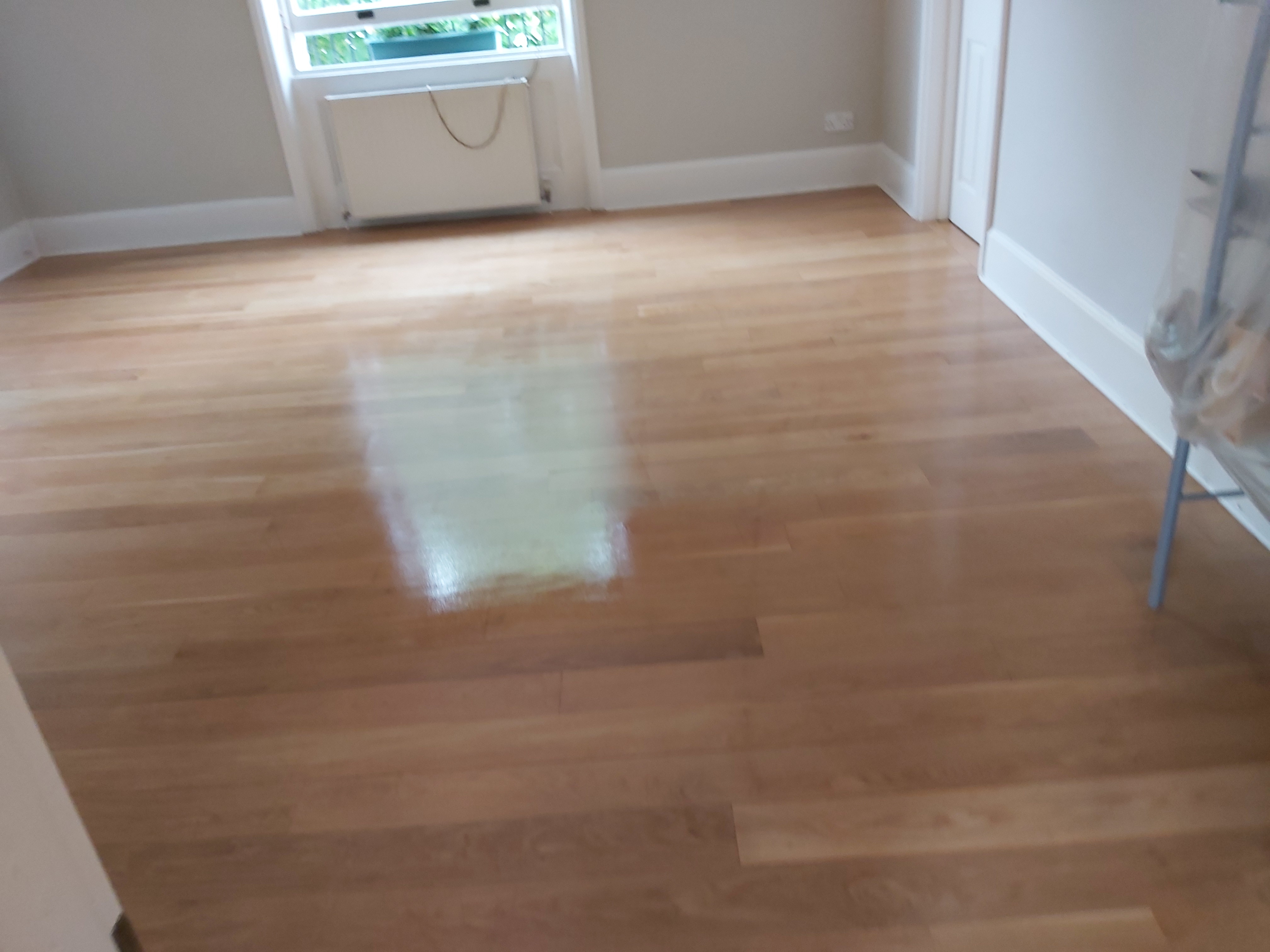 Hardwood floor after sanding work in W2
