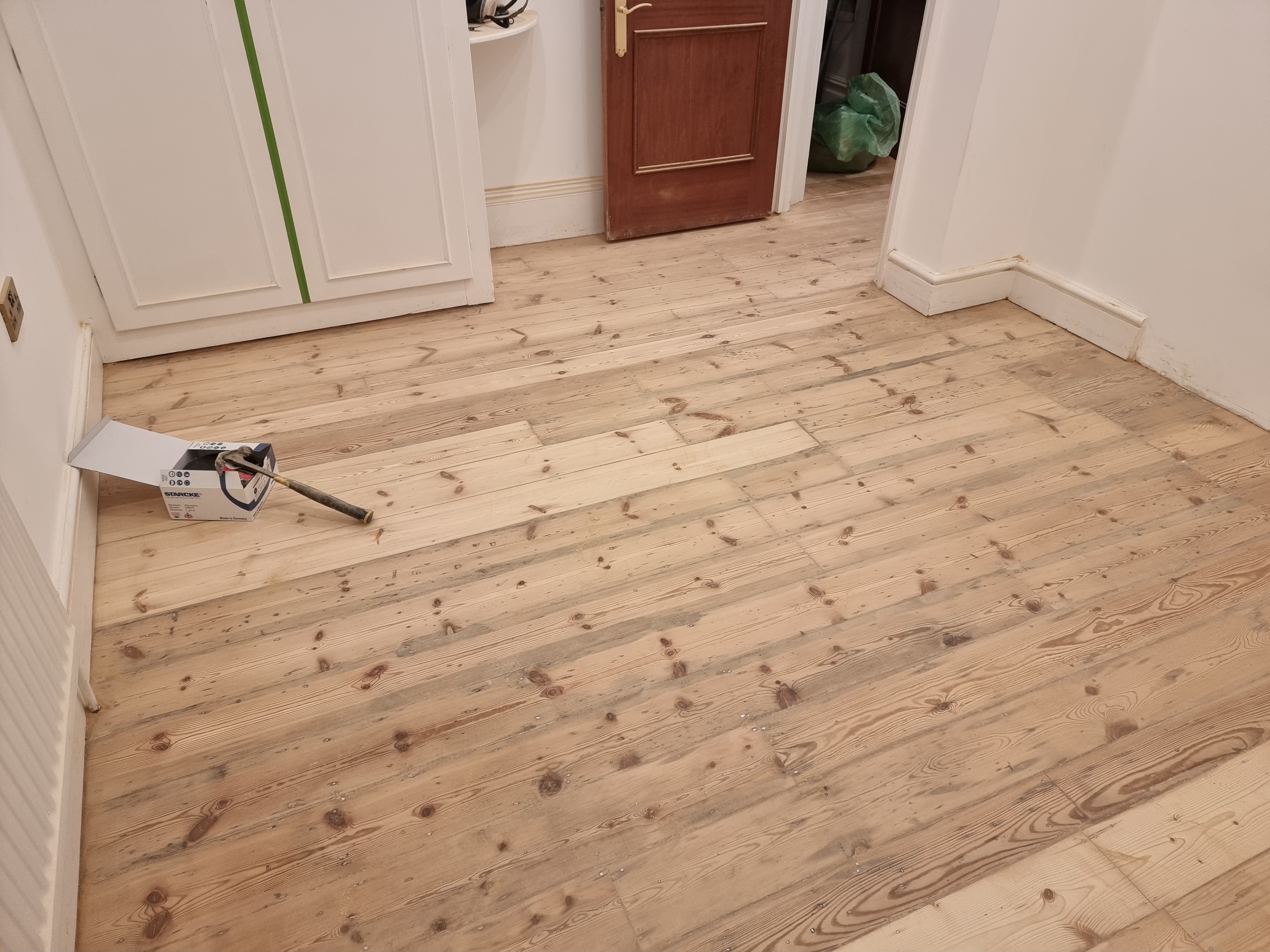 Floorboards floor after sanding work in W5