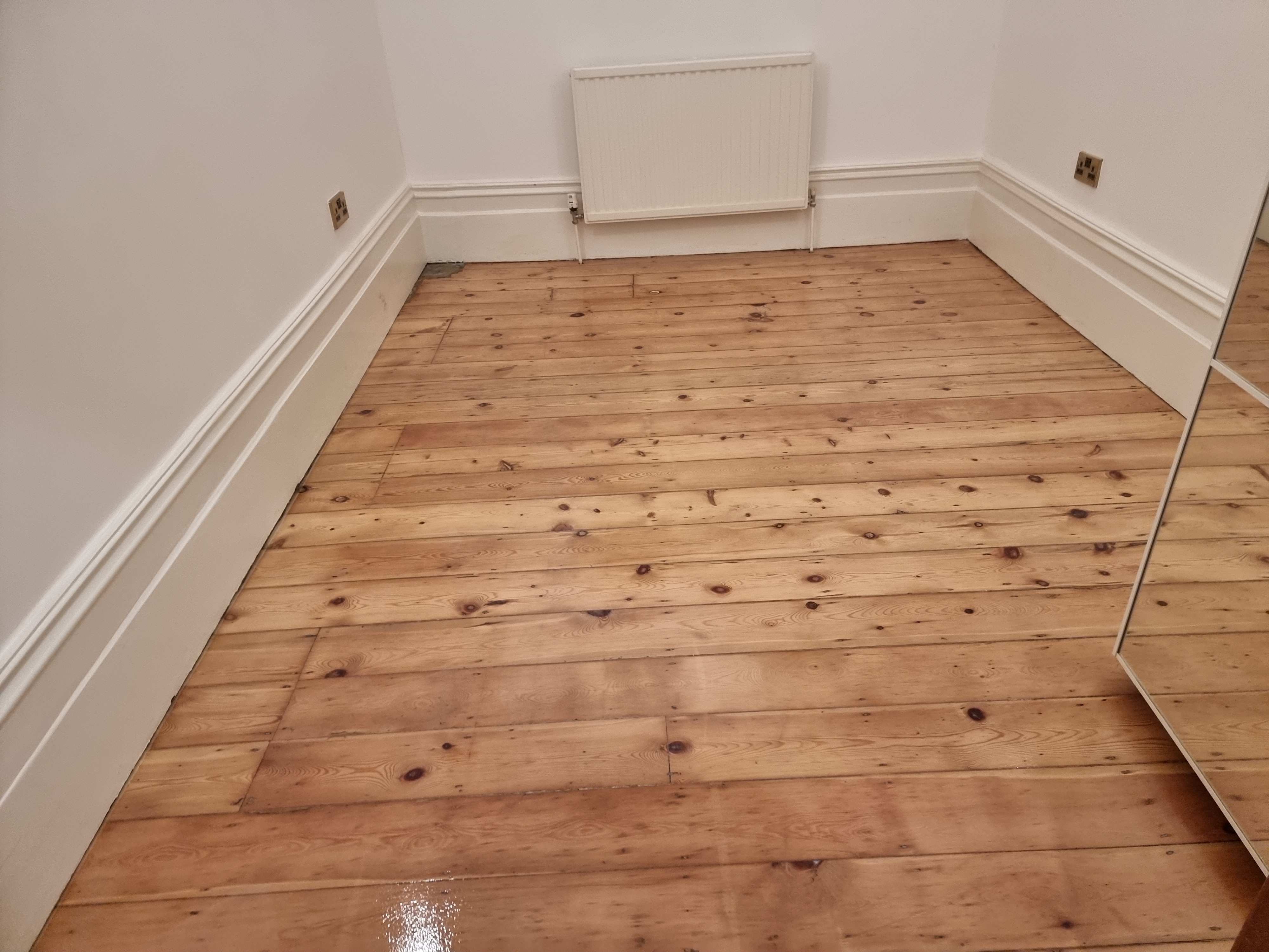 Floorboards floor after sanding work in W5