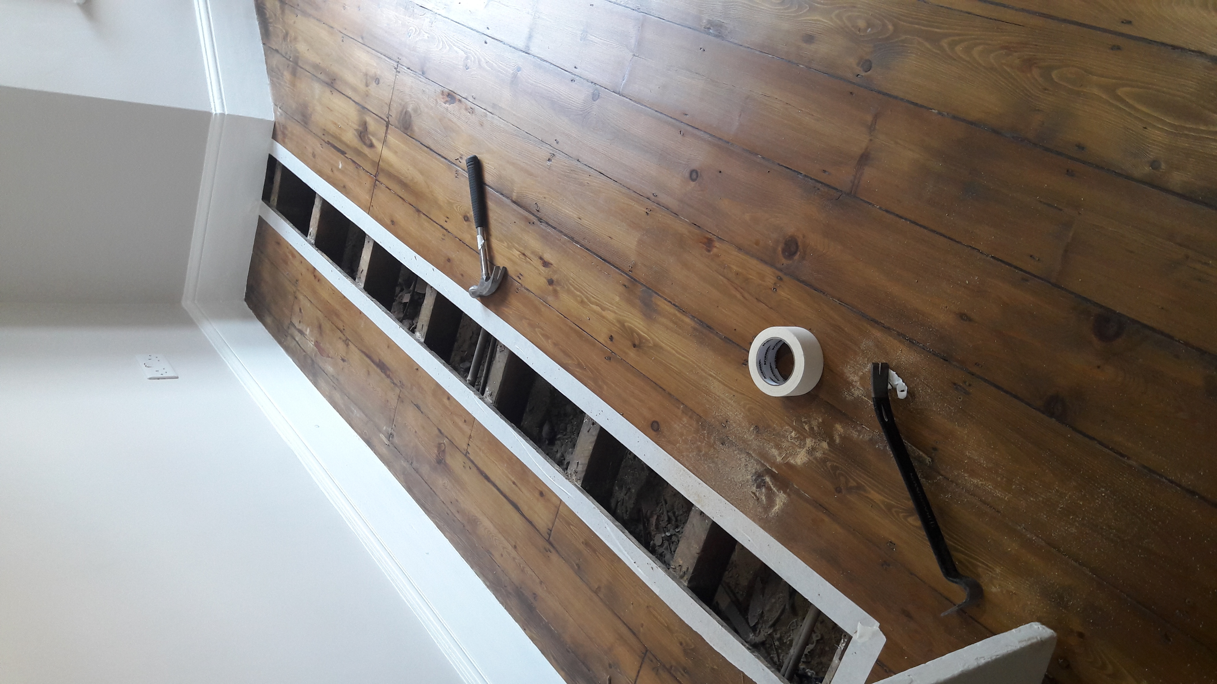 Floorboards floor after fitting work in W5