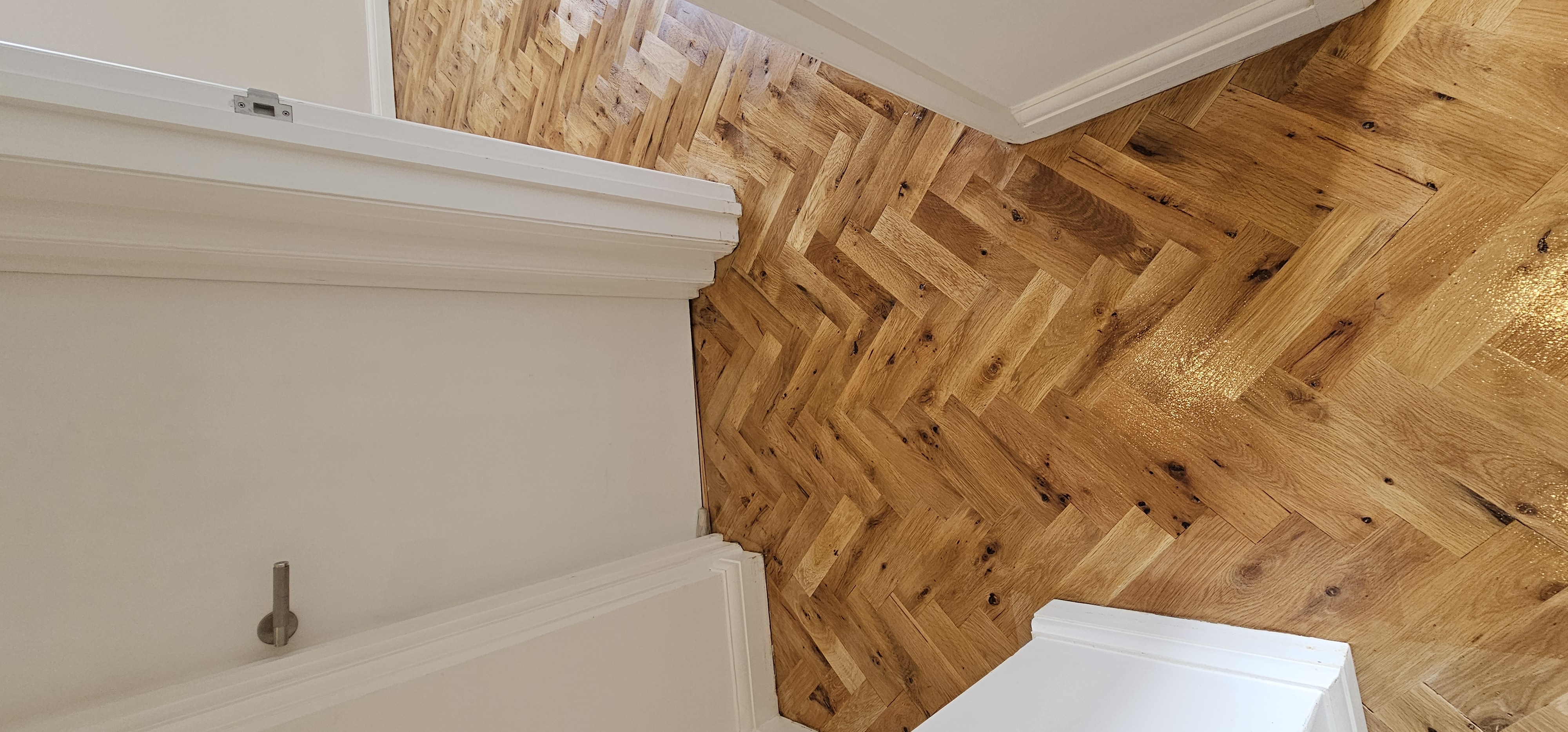 Parquet floor after sanding work in W9