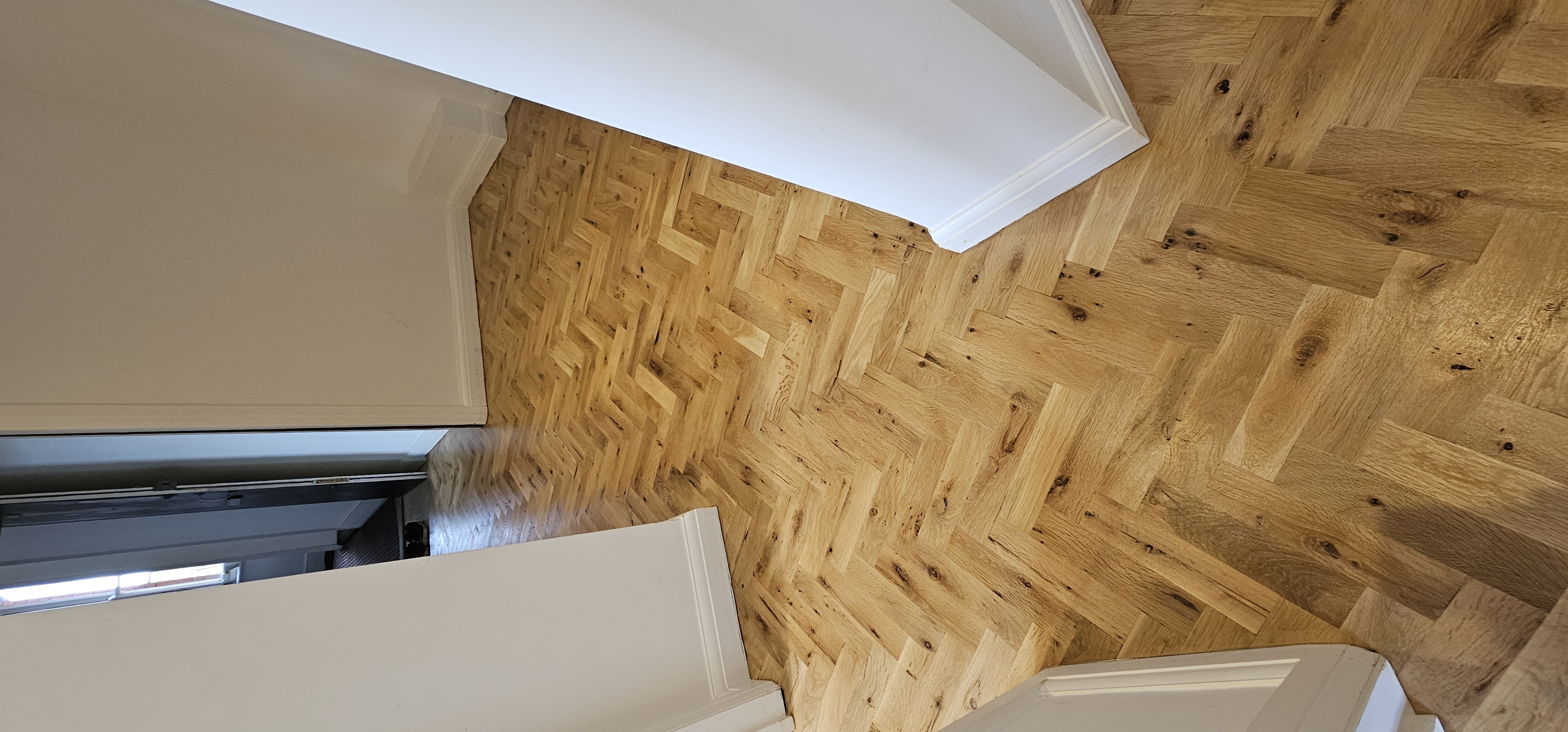 Parquet floor after sanding work in W9