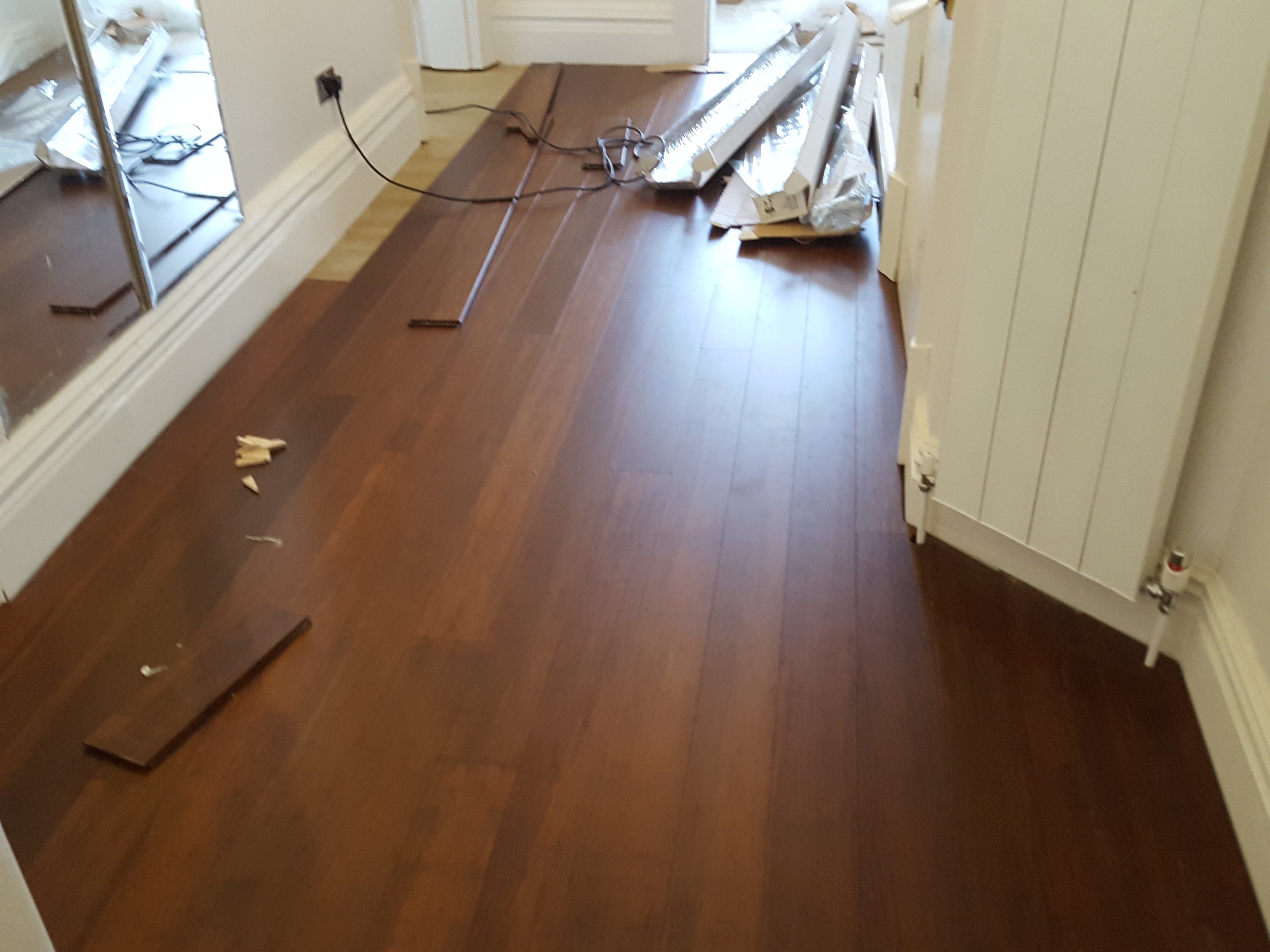 Engineered Wood floor after fitting work in W9