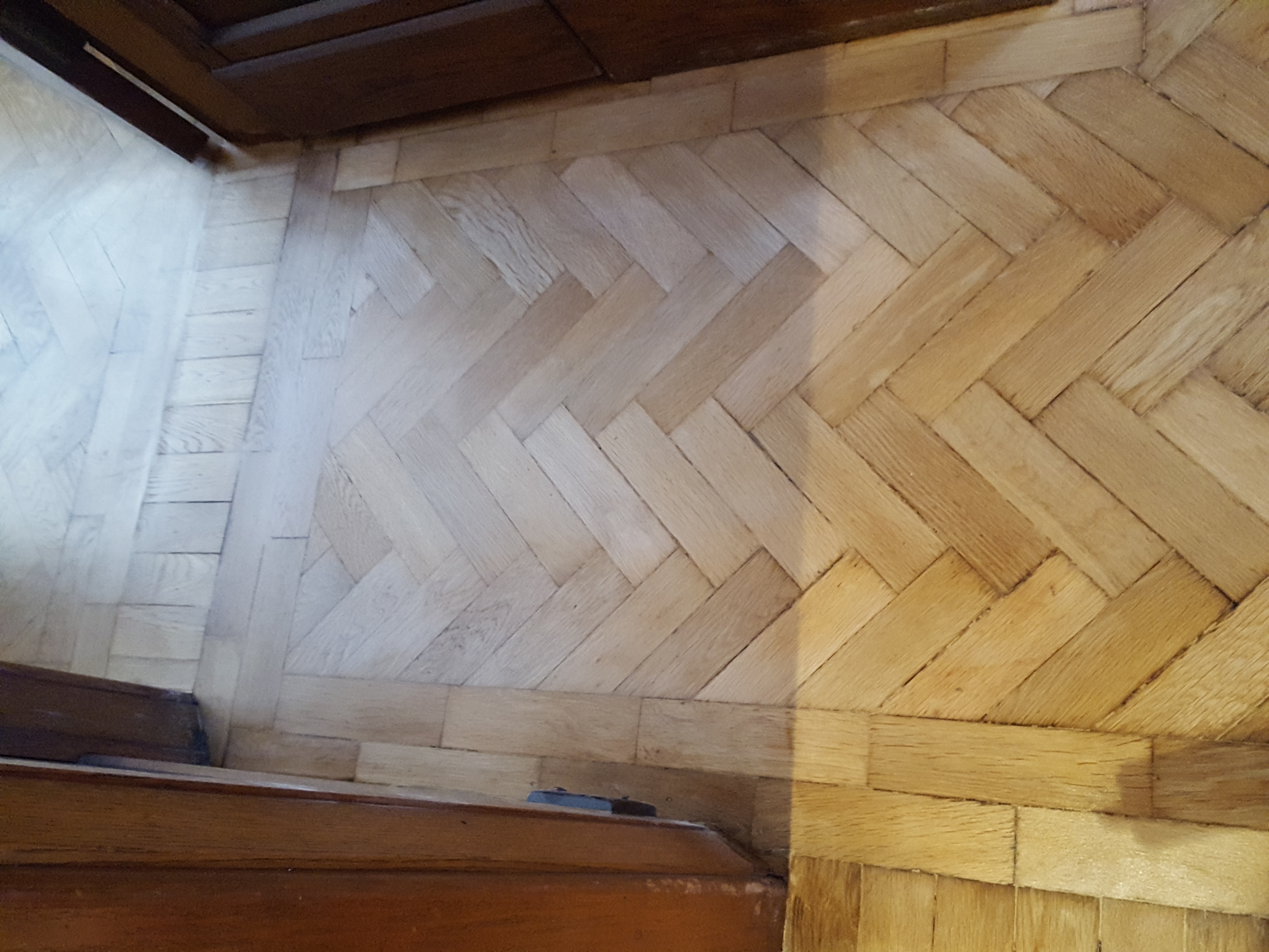 Parquet floor after sanding work in WD23