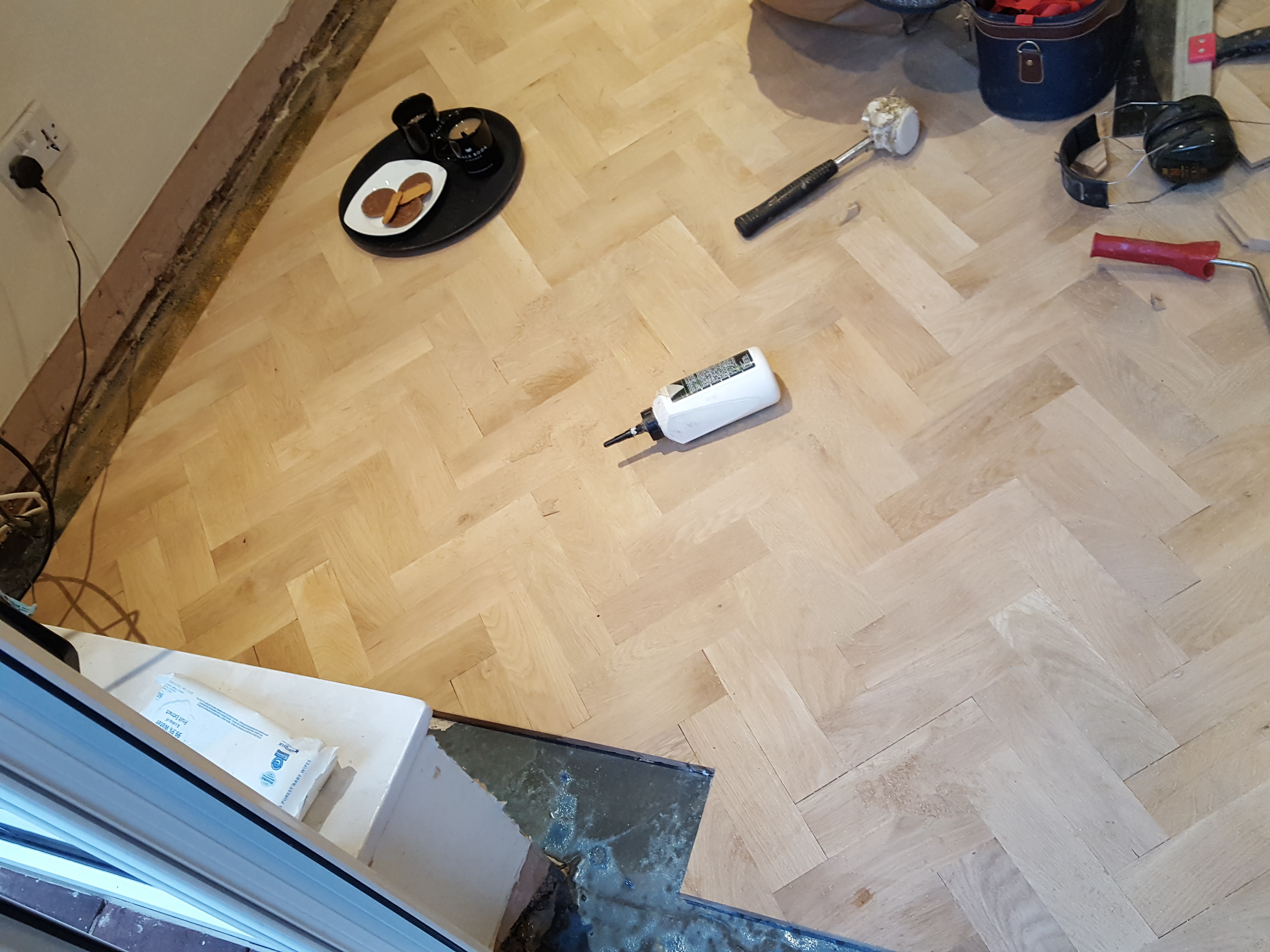 Parquet floor after sanding work in WD23