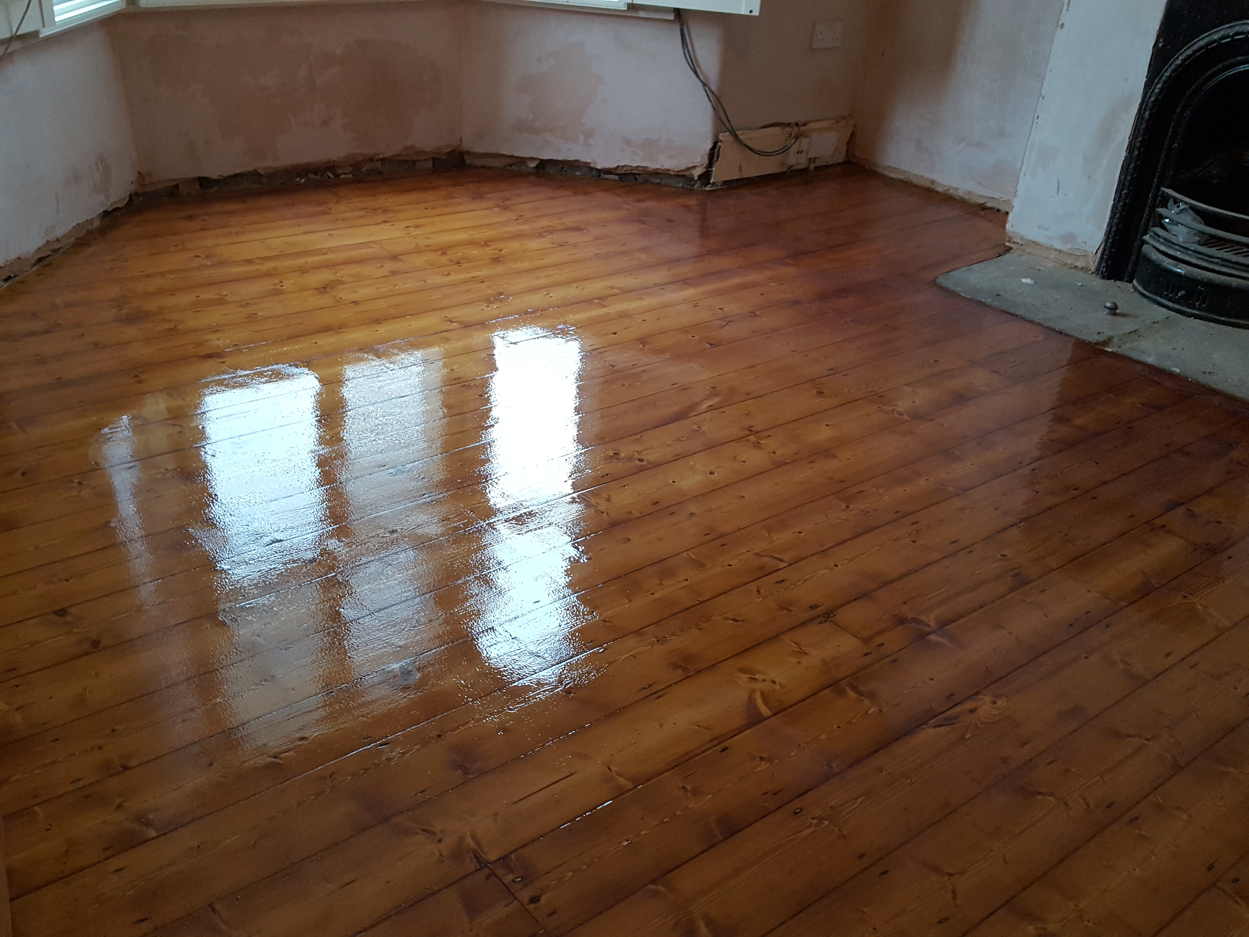 Floorboards floor after sanding work in WD24