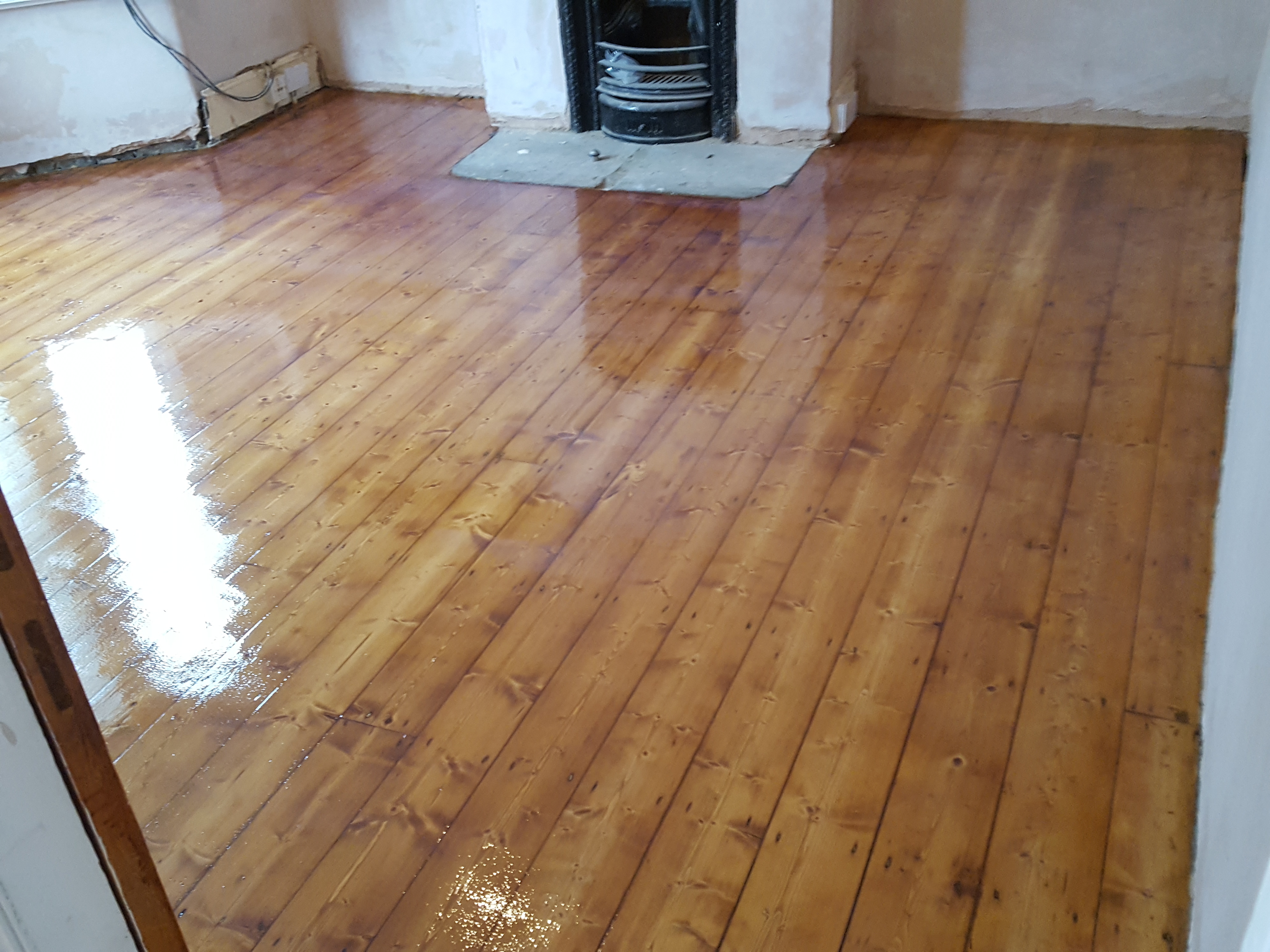 Floorboards floor after sanding work in WD24