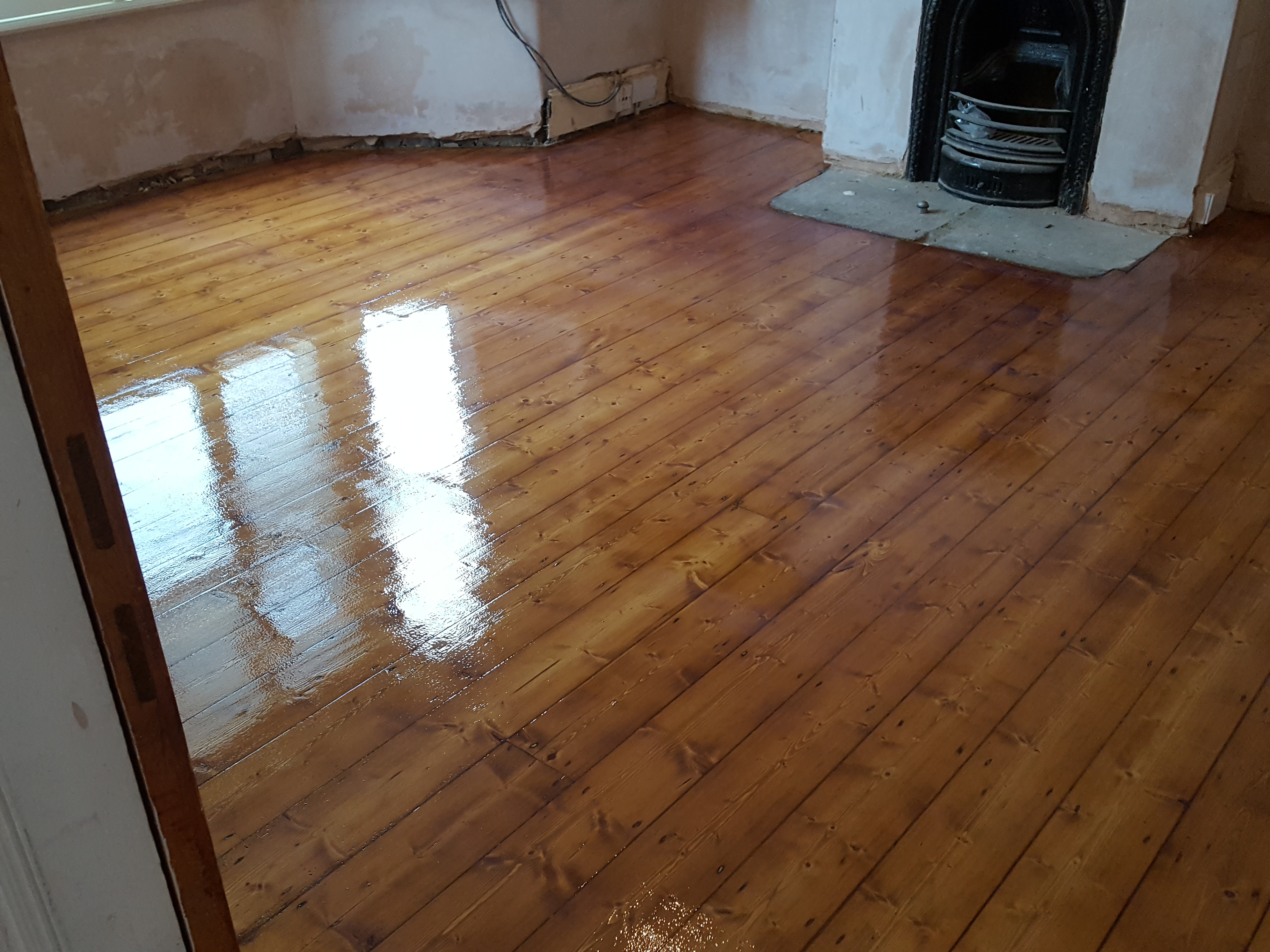 Floorboards floor after sanding work in WD24