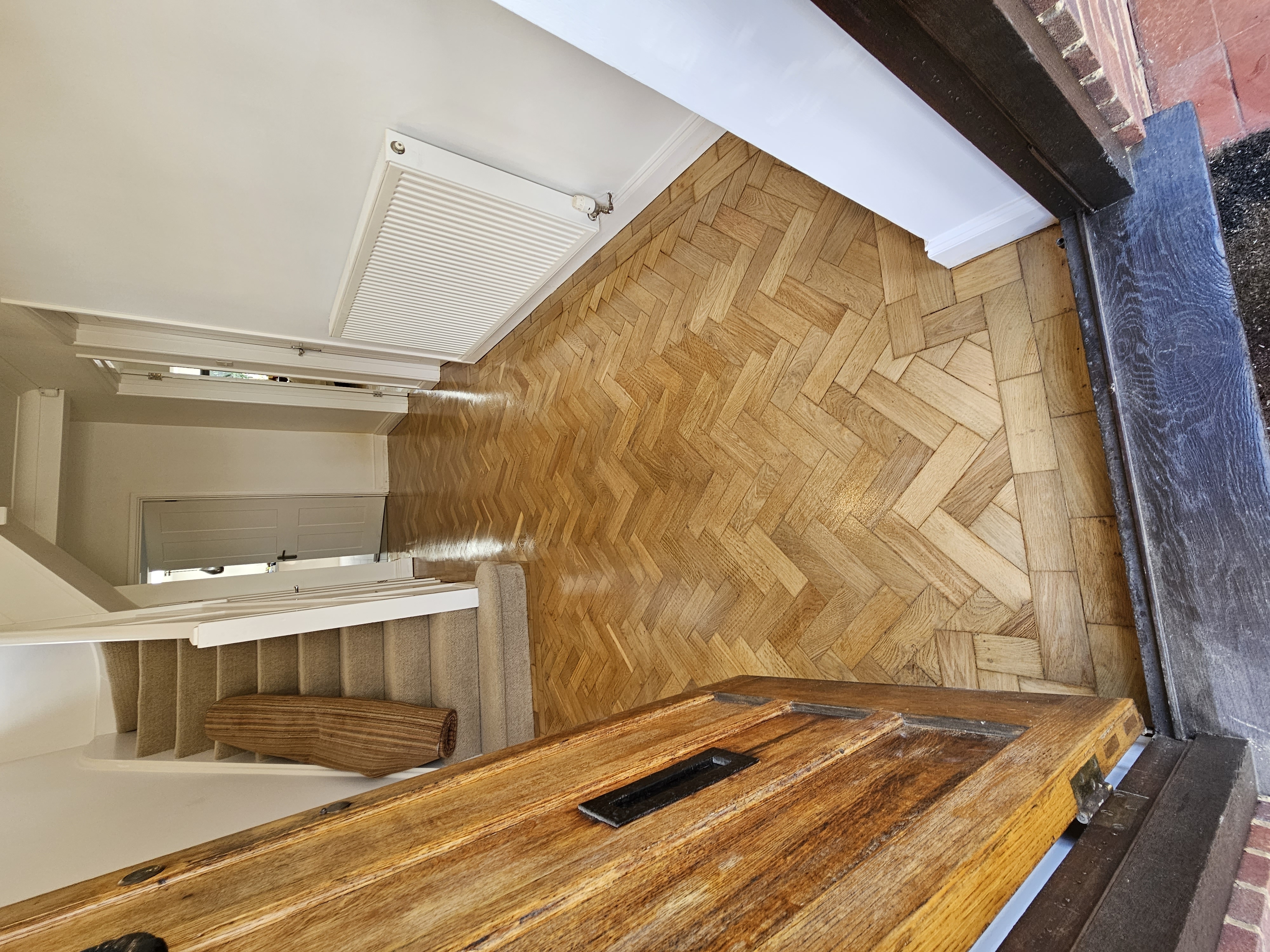 Parquet floor after sanding work in WD3