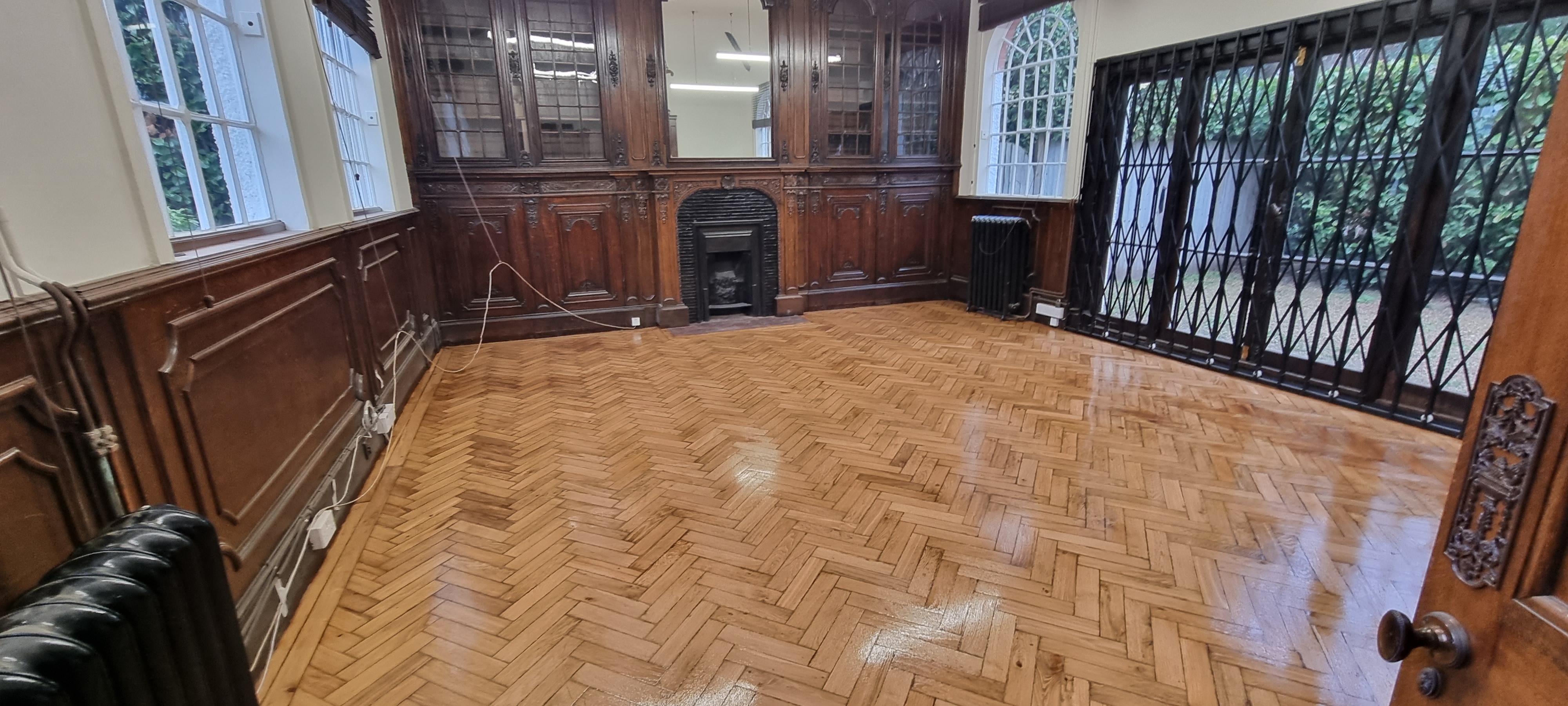 Parquet floor after sanding work in WD7
